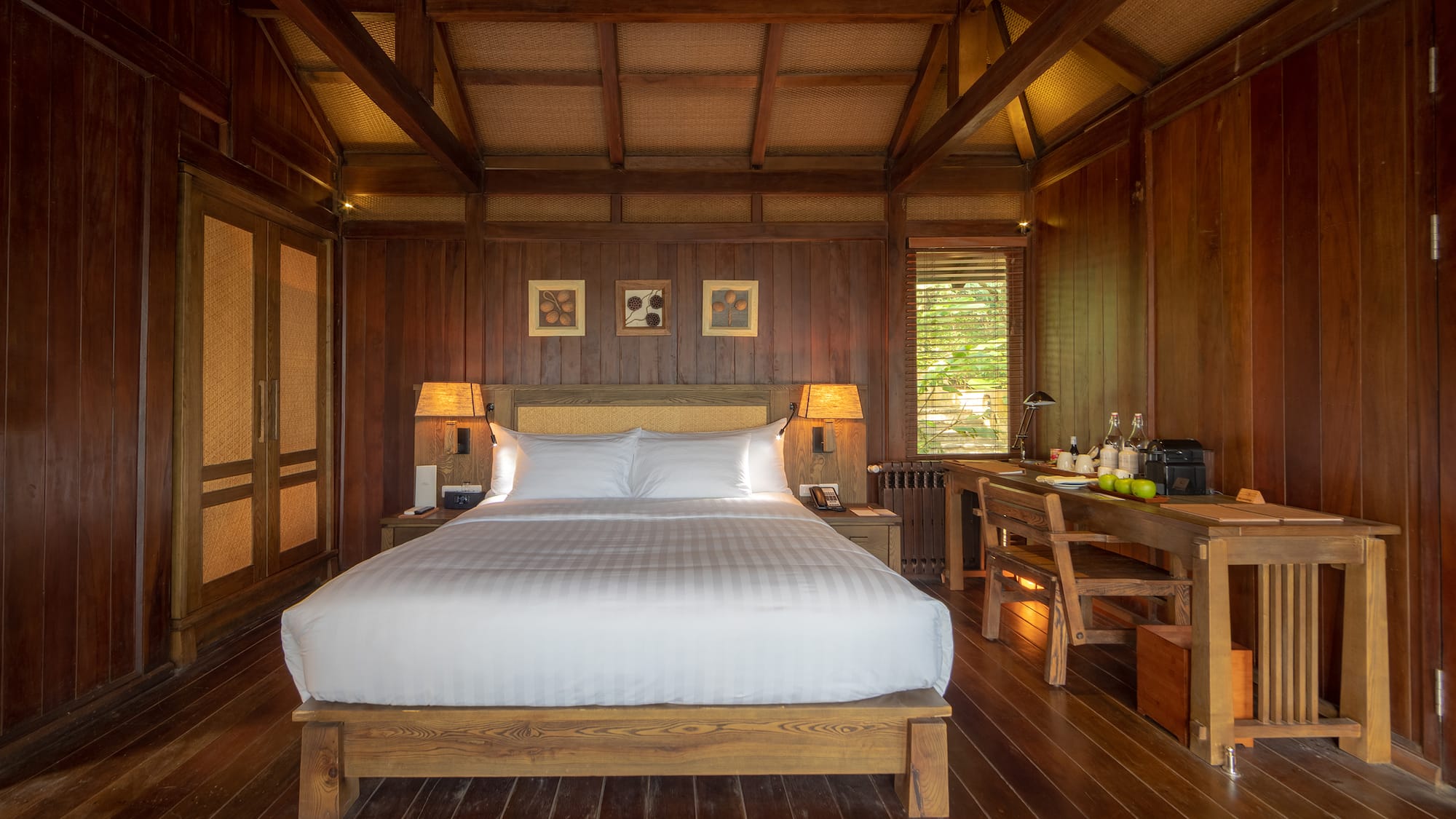 a room with a bed and a desk