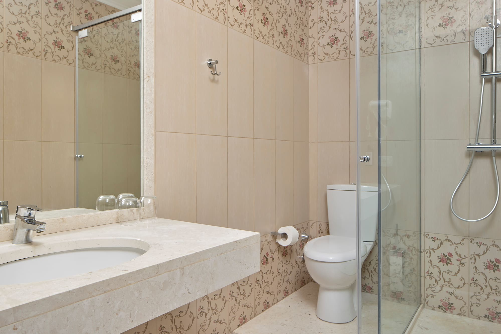 a bathroom with a shower and toilet