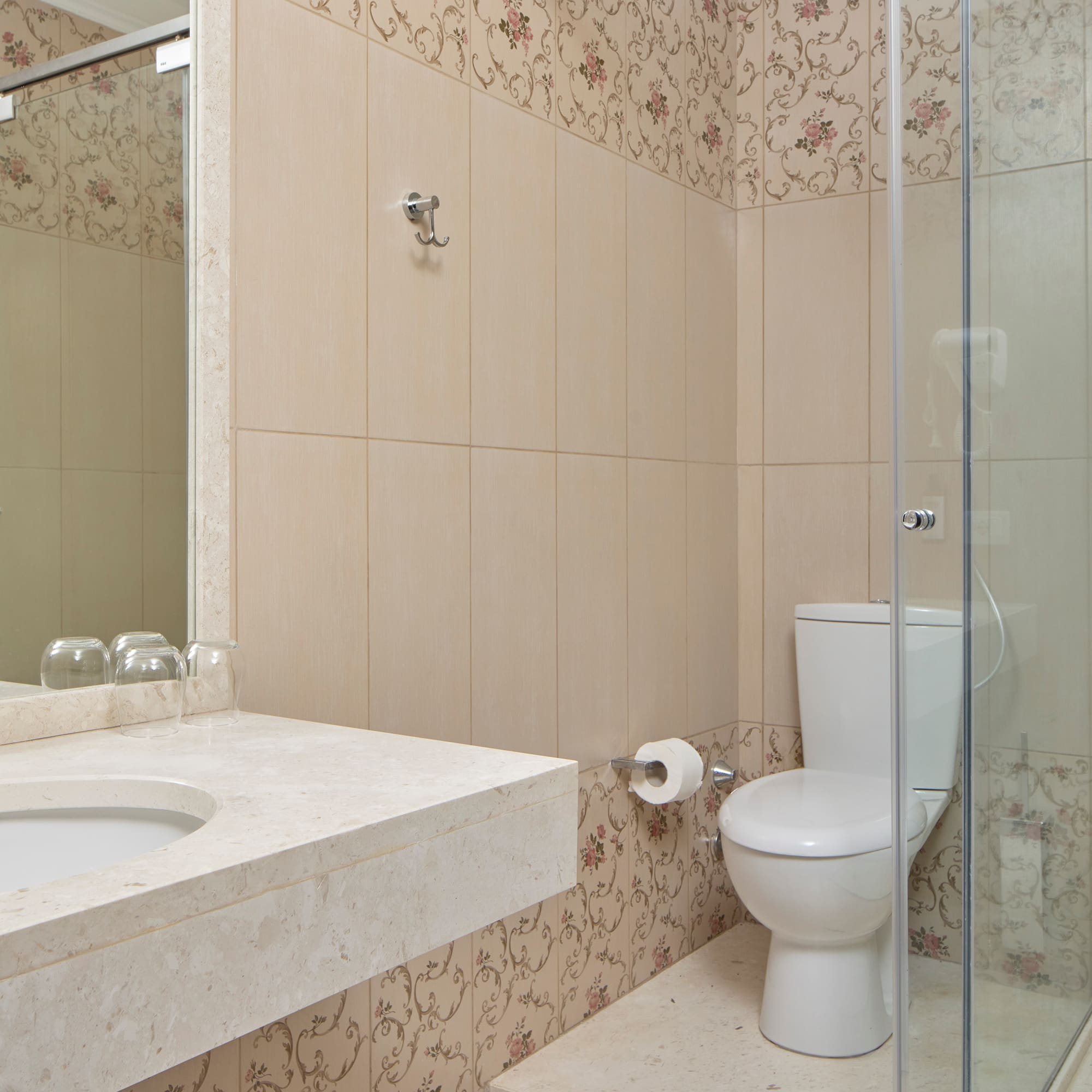 a bathroom with a shower and toilet