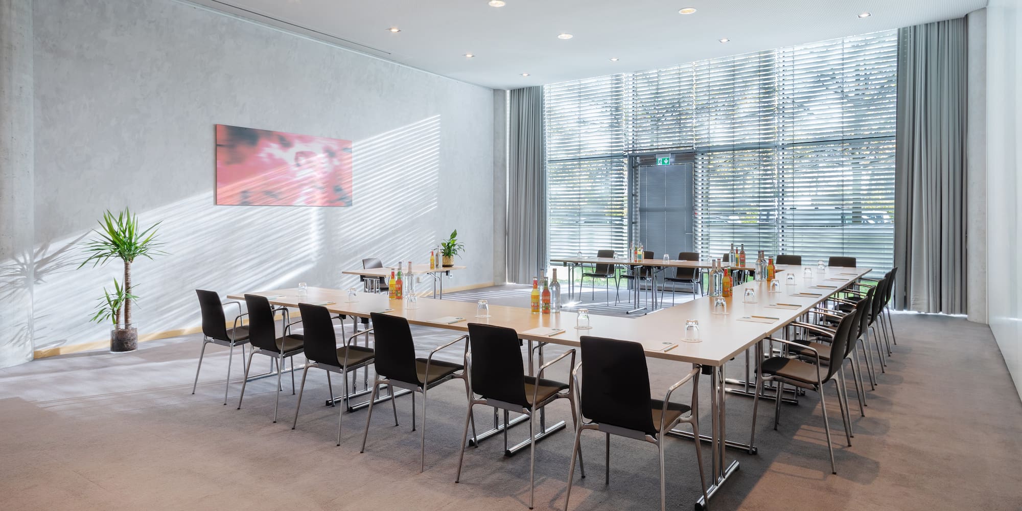 a room with a table and chairs