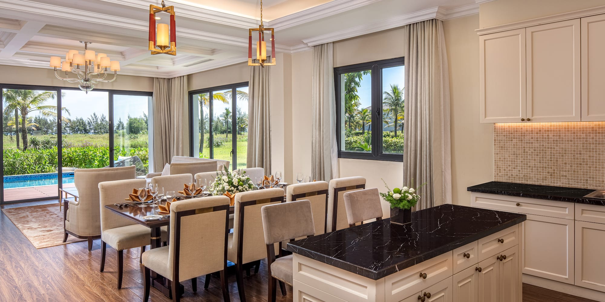 a dining room with a table and chairs