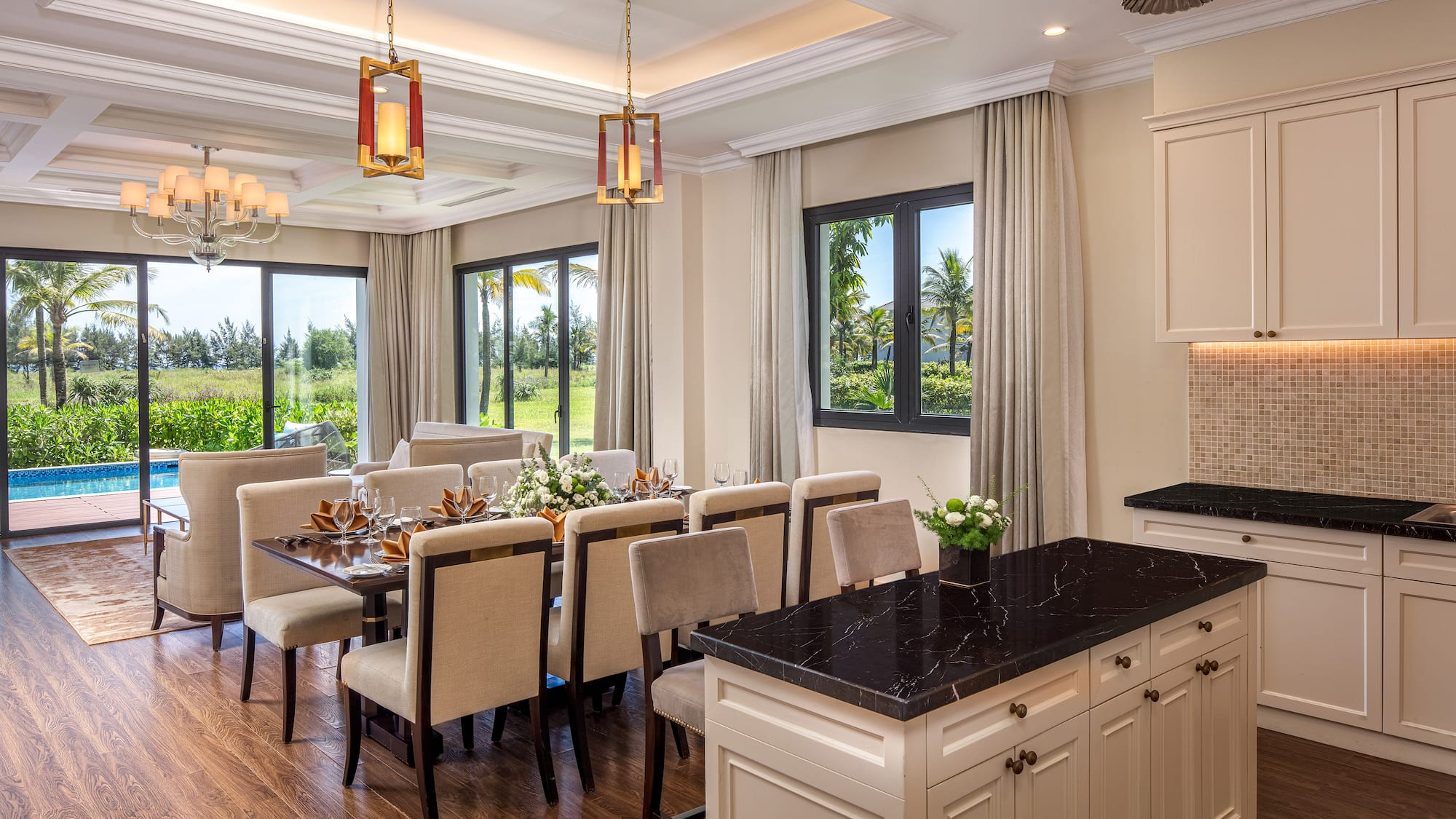 a dining room with a table and chairs