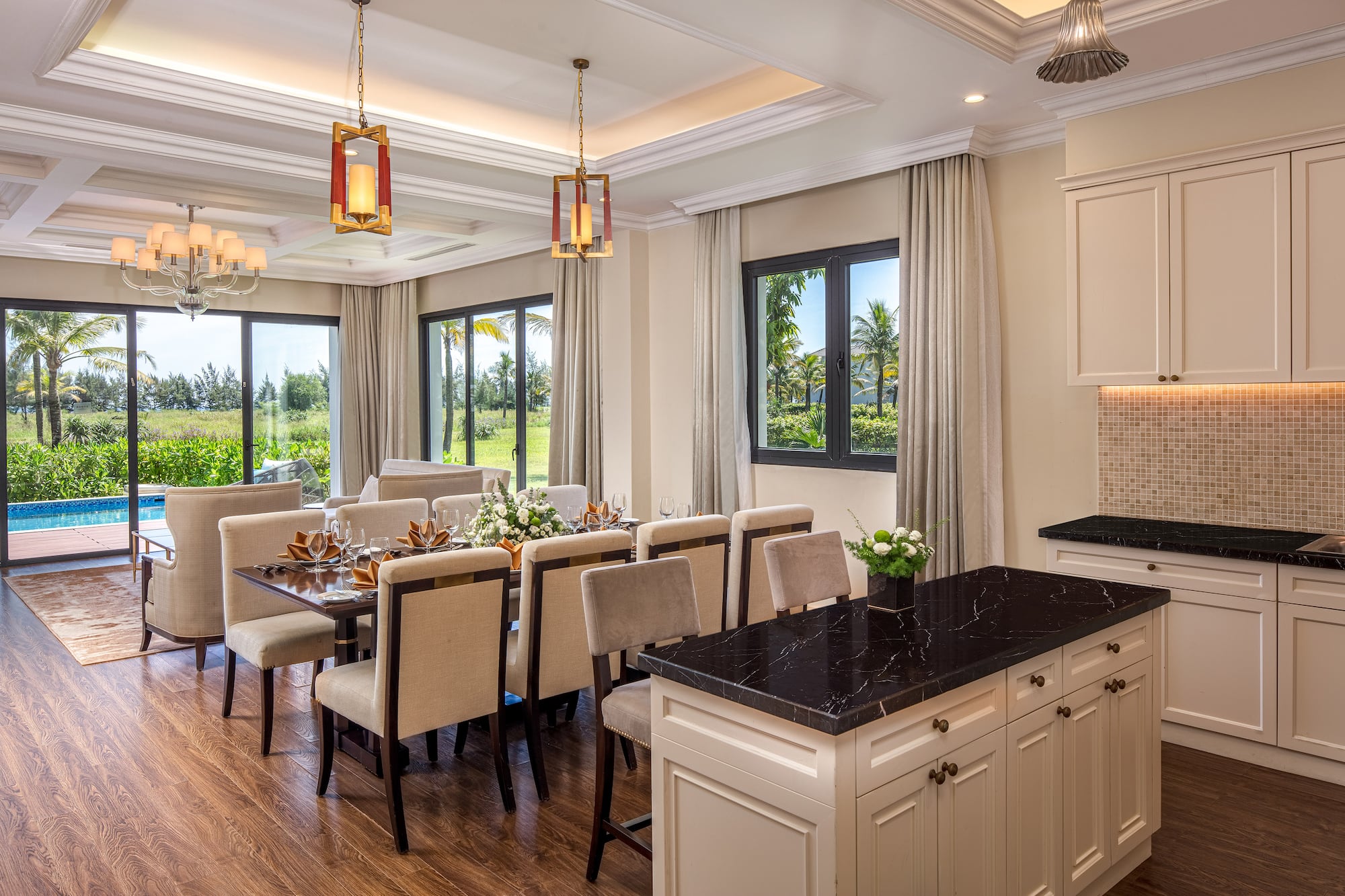 a dining room with a table and chairs