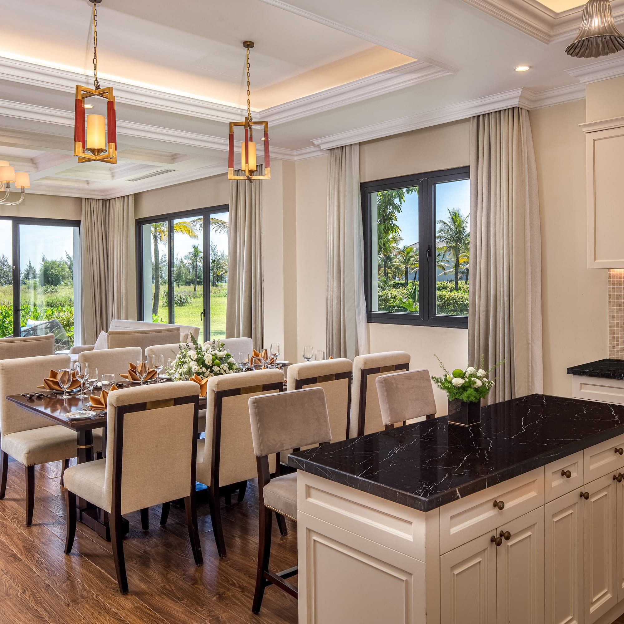 a dining room with a table and chairs
