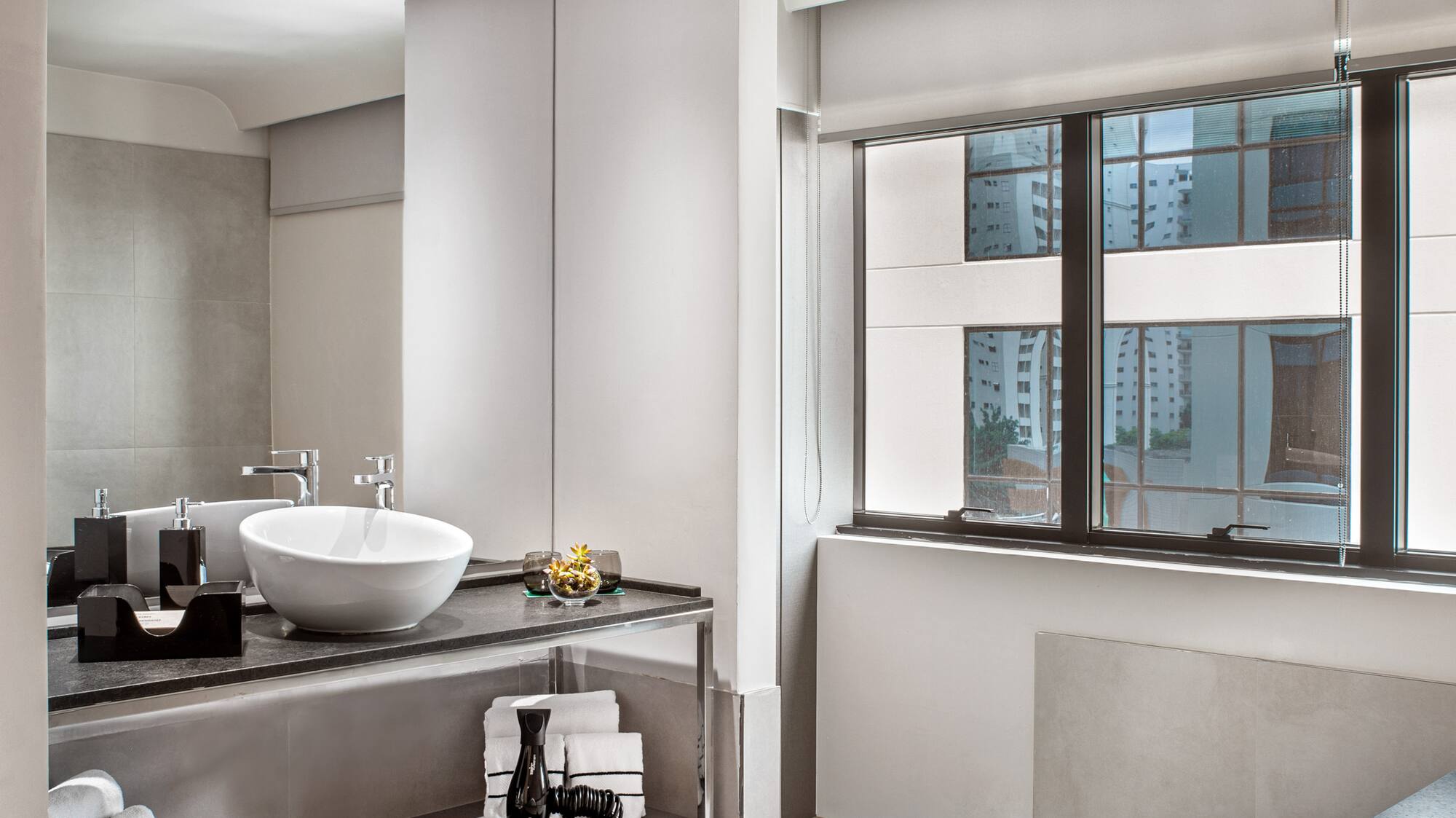 a bathroom with a sink and a bathtub