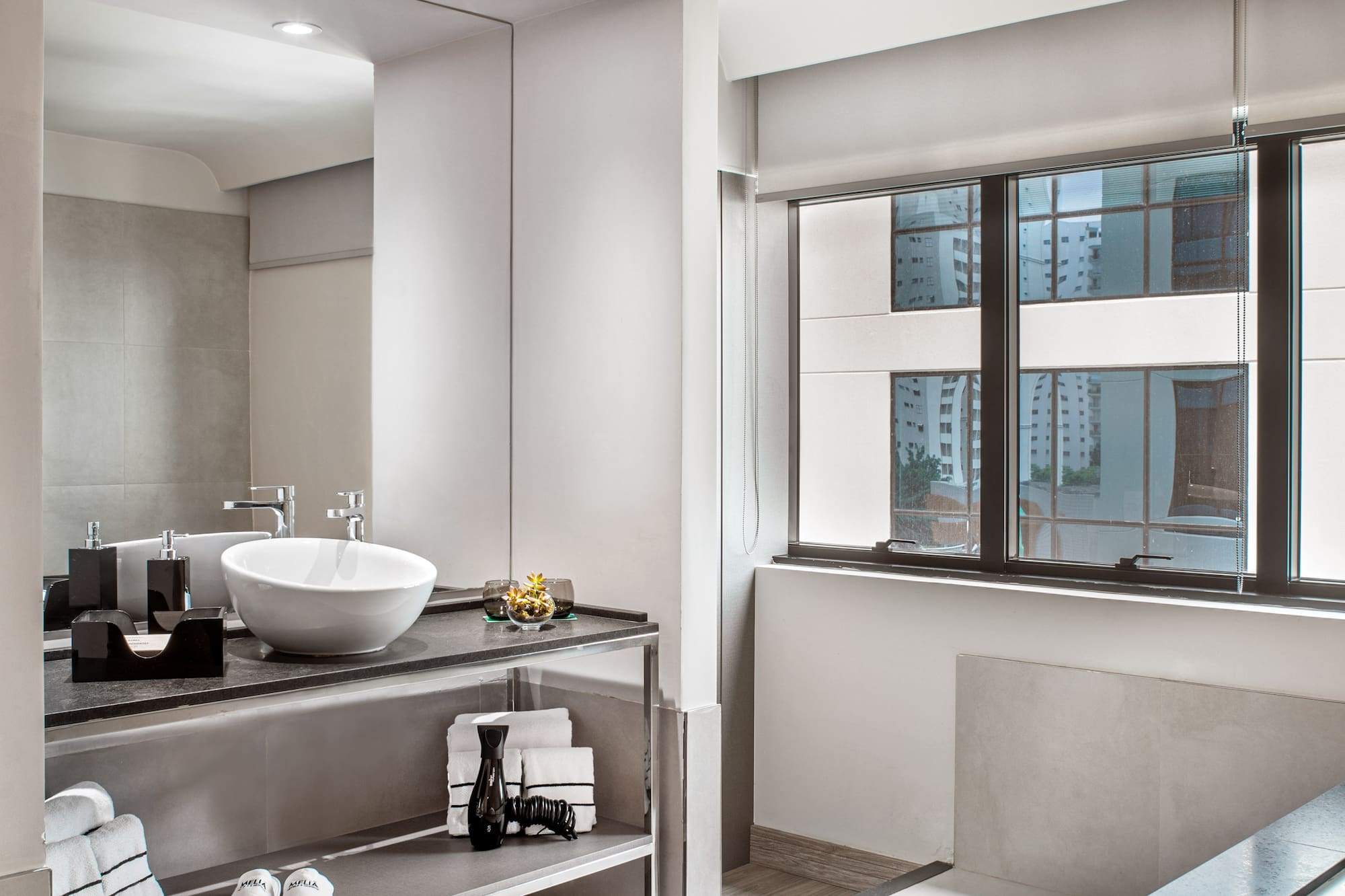 a bathroom with a sink and a bathtub