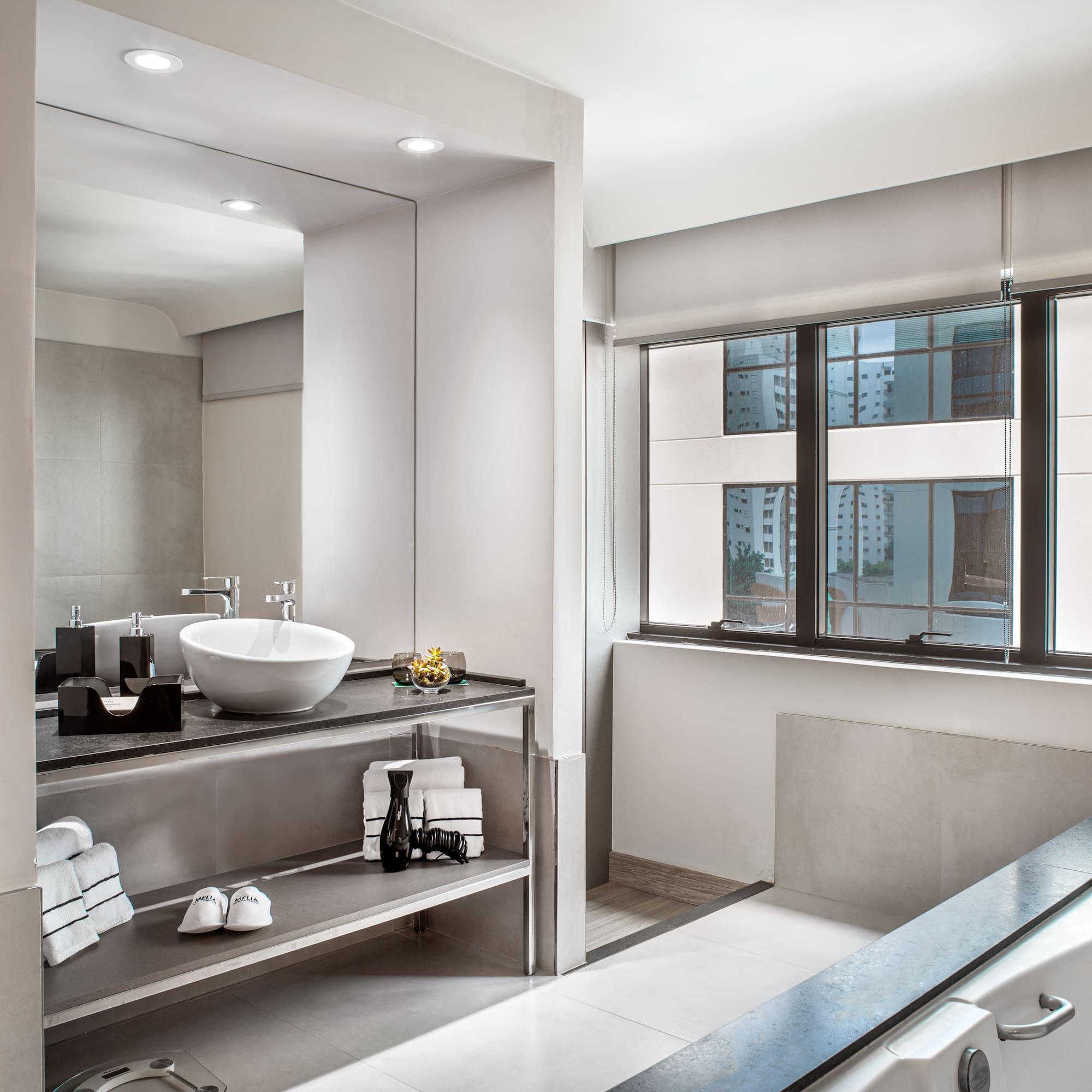 a bathroom with a sink and a bathtub