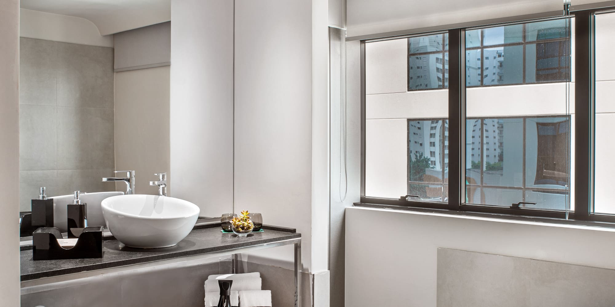 a bathroom with a sink and a bathtub