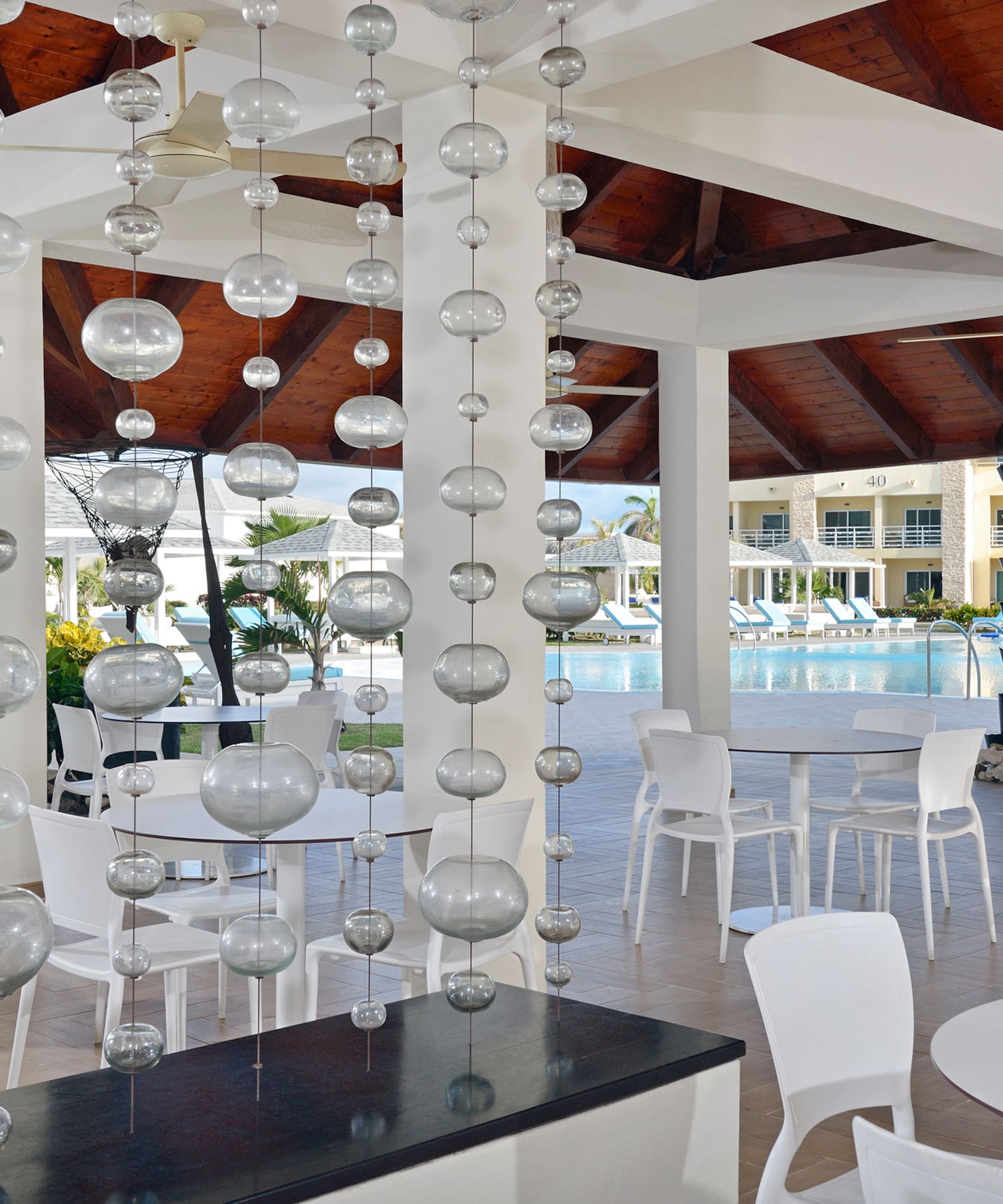 a pool with a swimming pool and a pool in the background