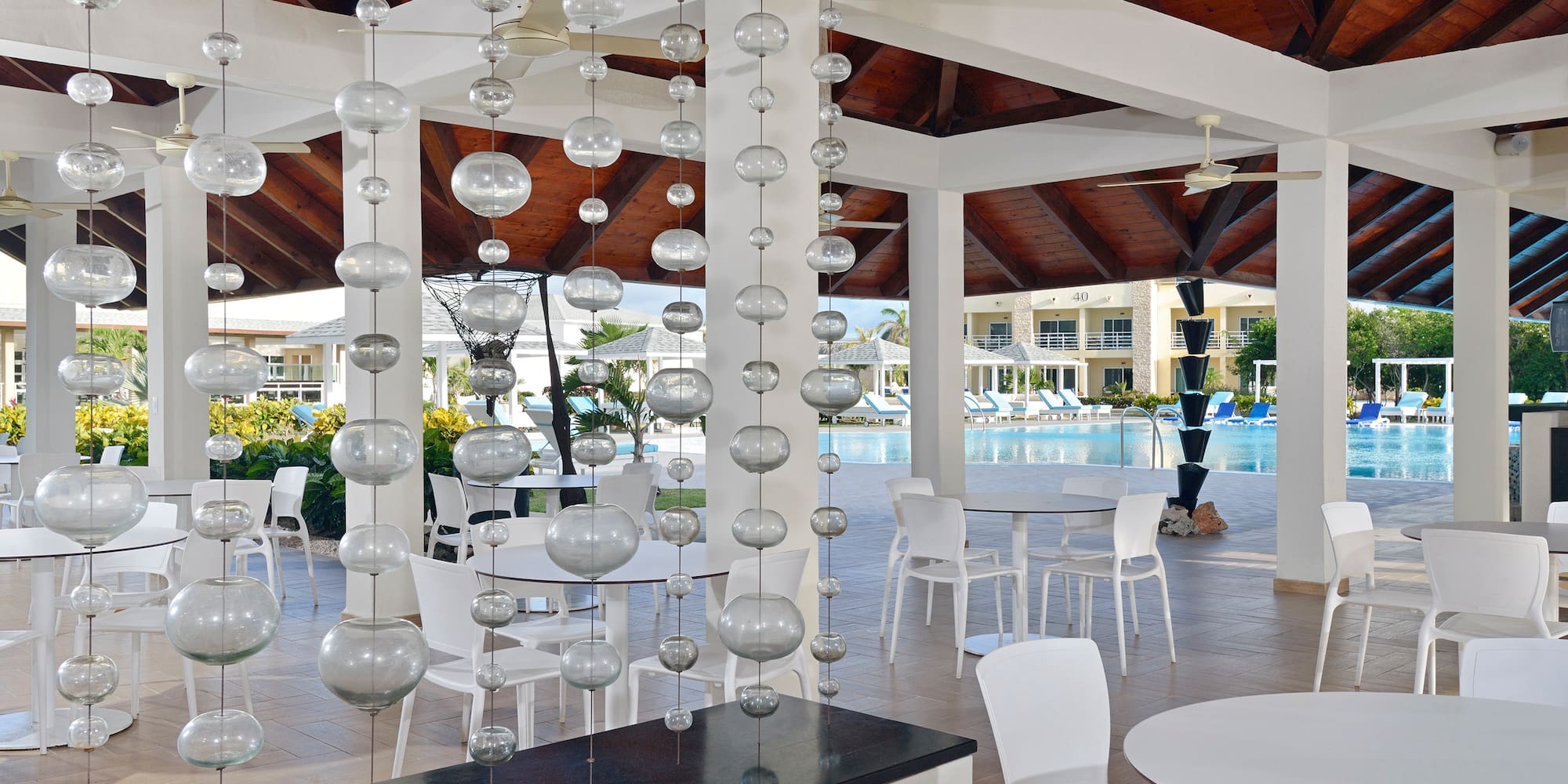 a pool with a swimming pool and a pool in the background