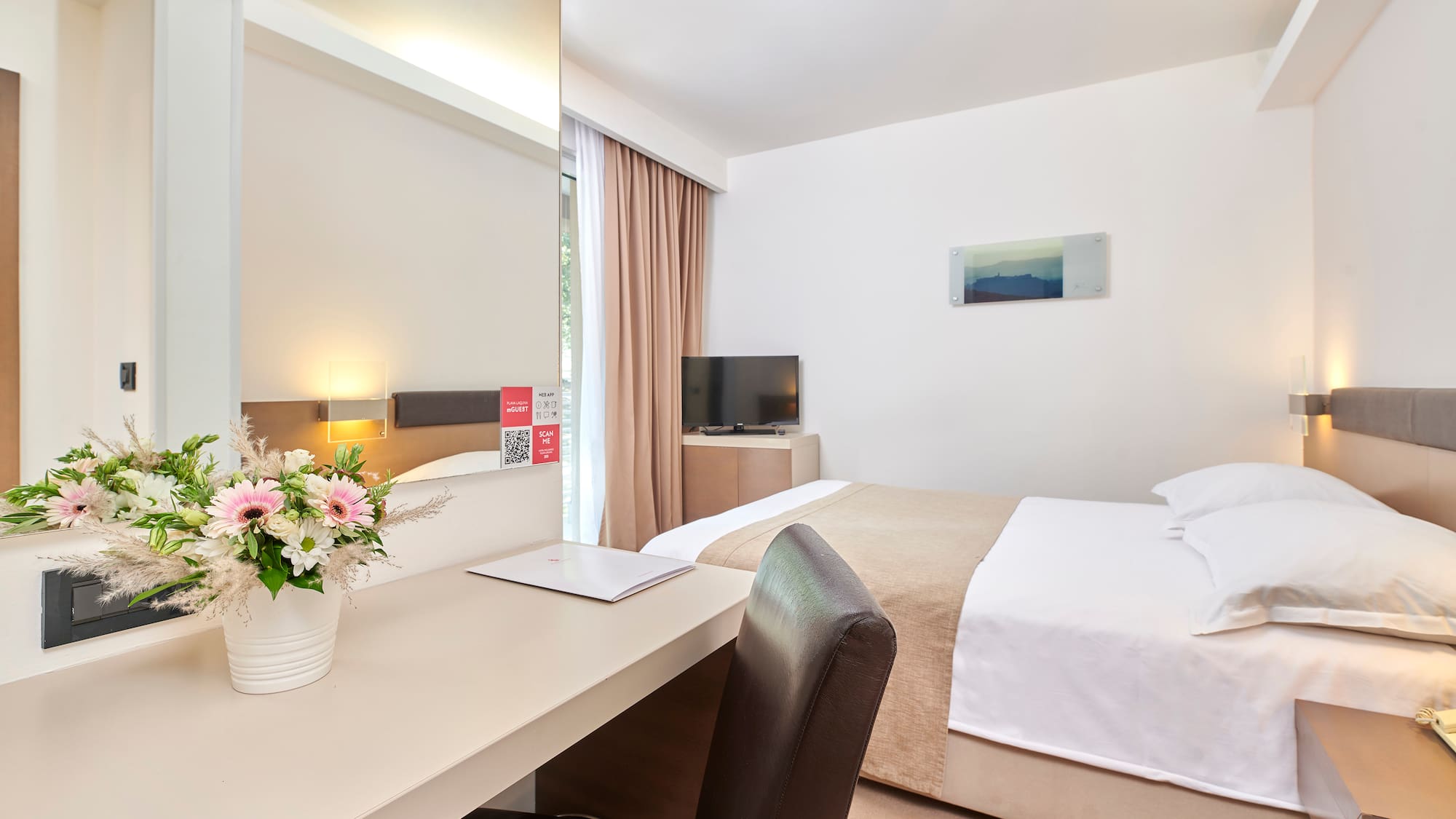 a room with a bed and a table