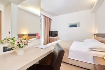 a room with a bed and a table