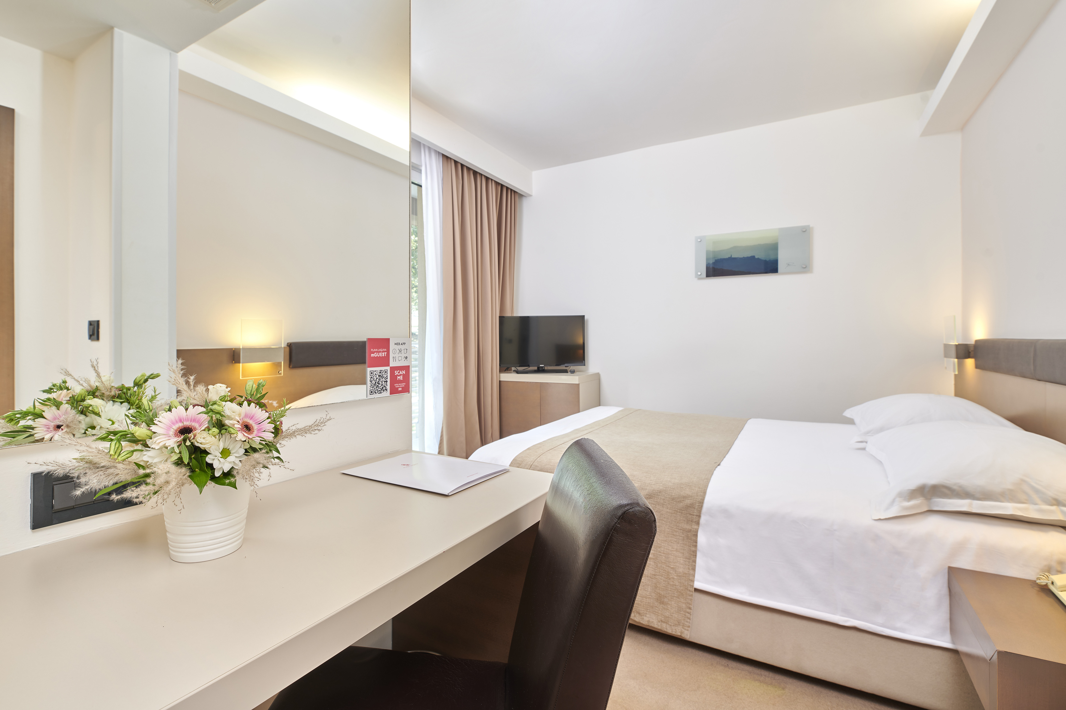 a room with a bed and a table