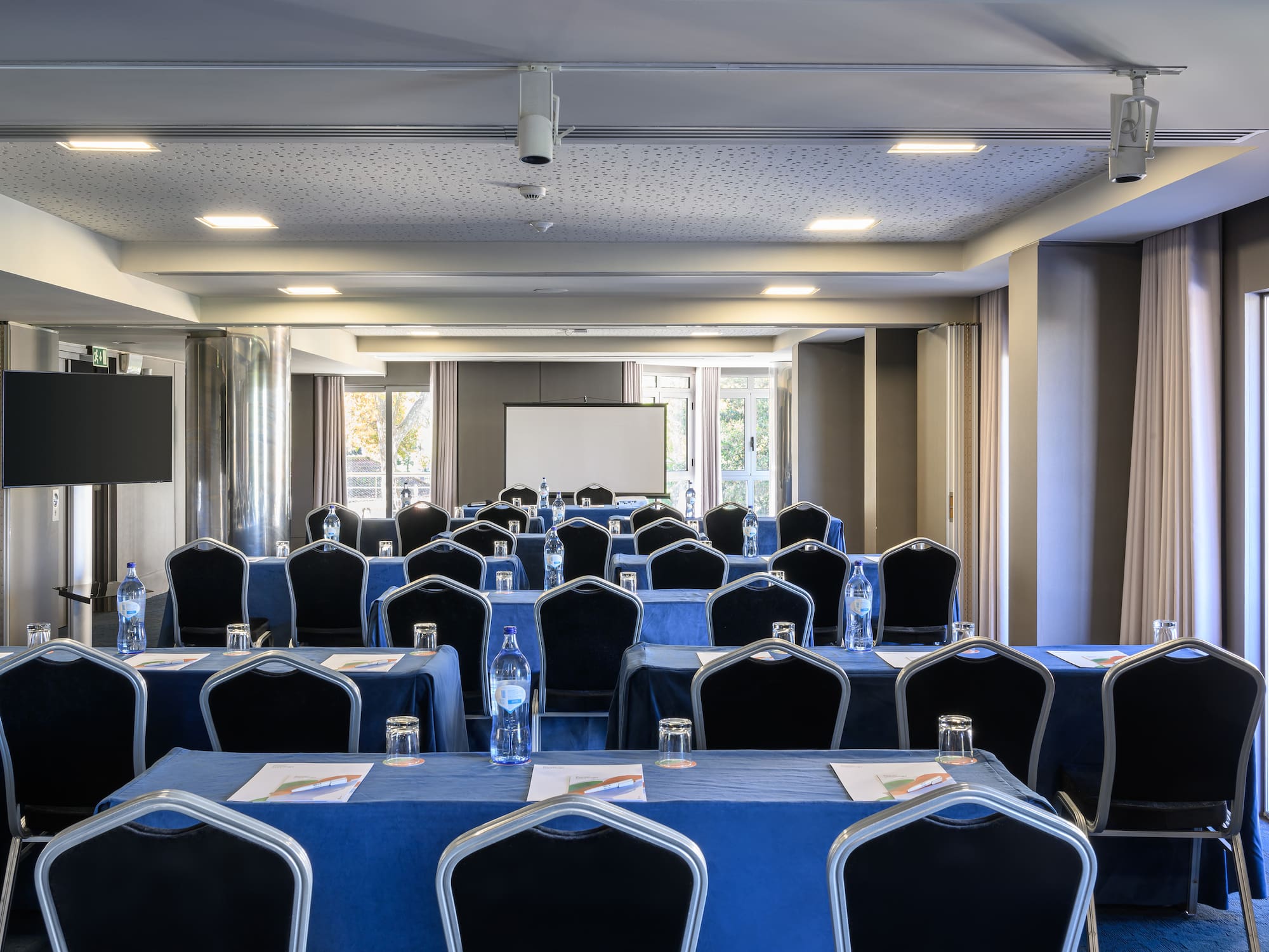 a room with tables and chairs