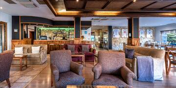 a room with chairs and tables