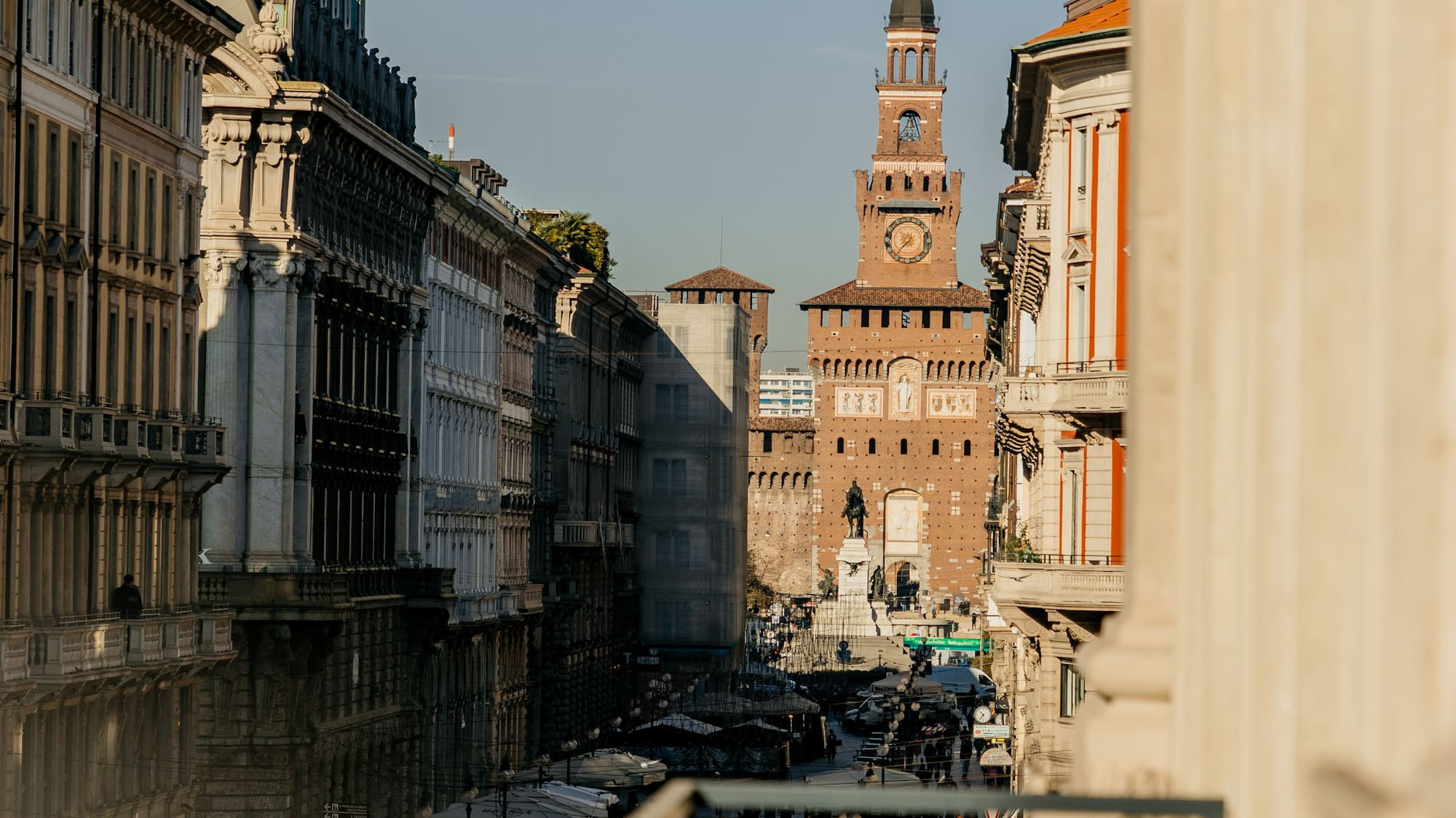 a city street with a clock tower
