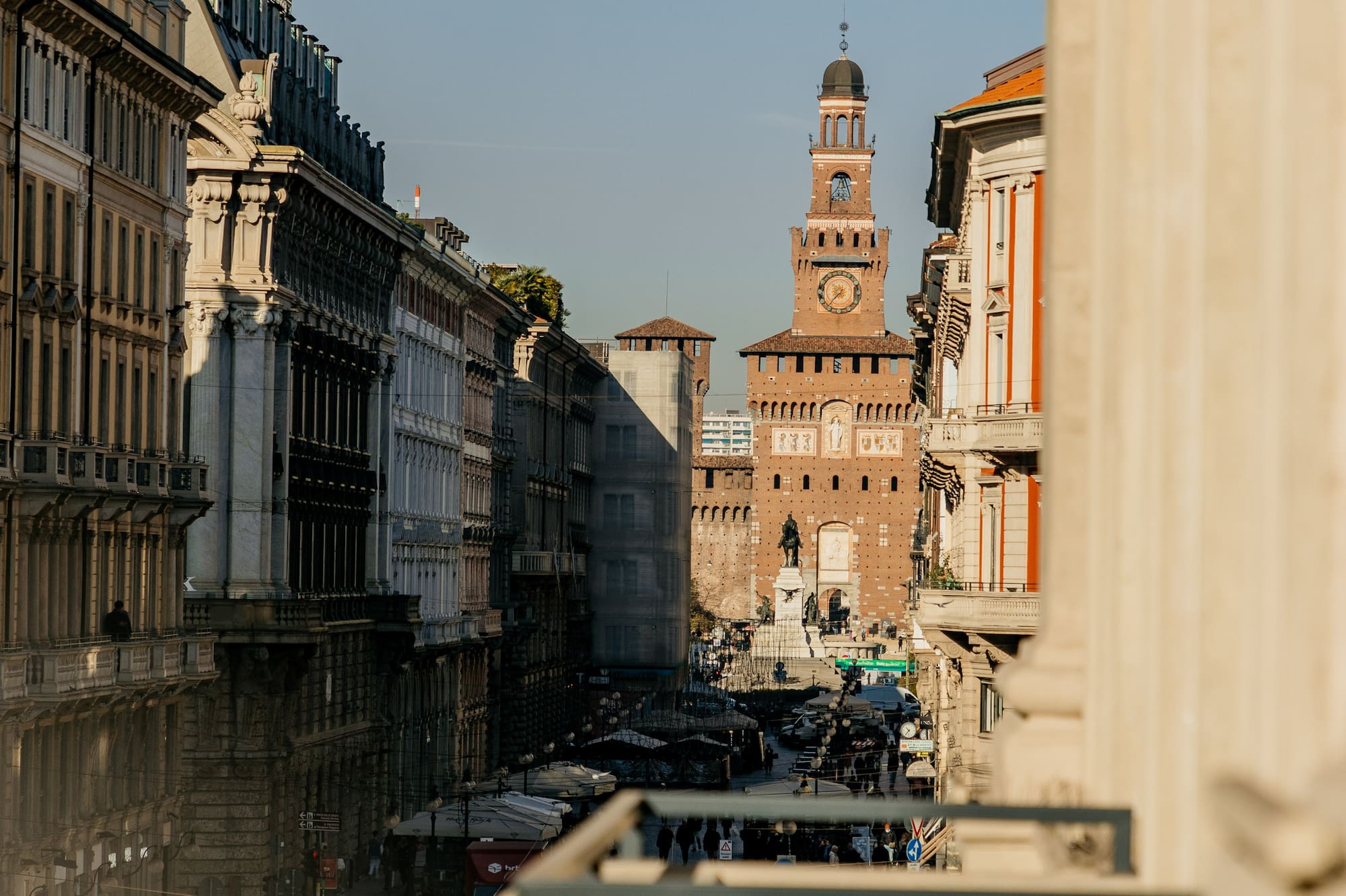 a city street with a clock tower