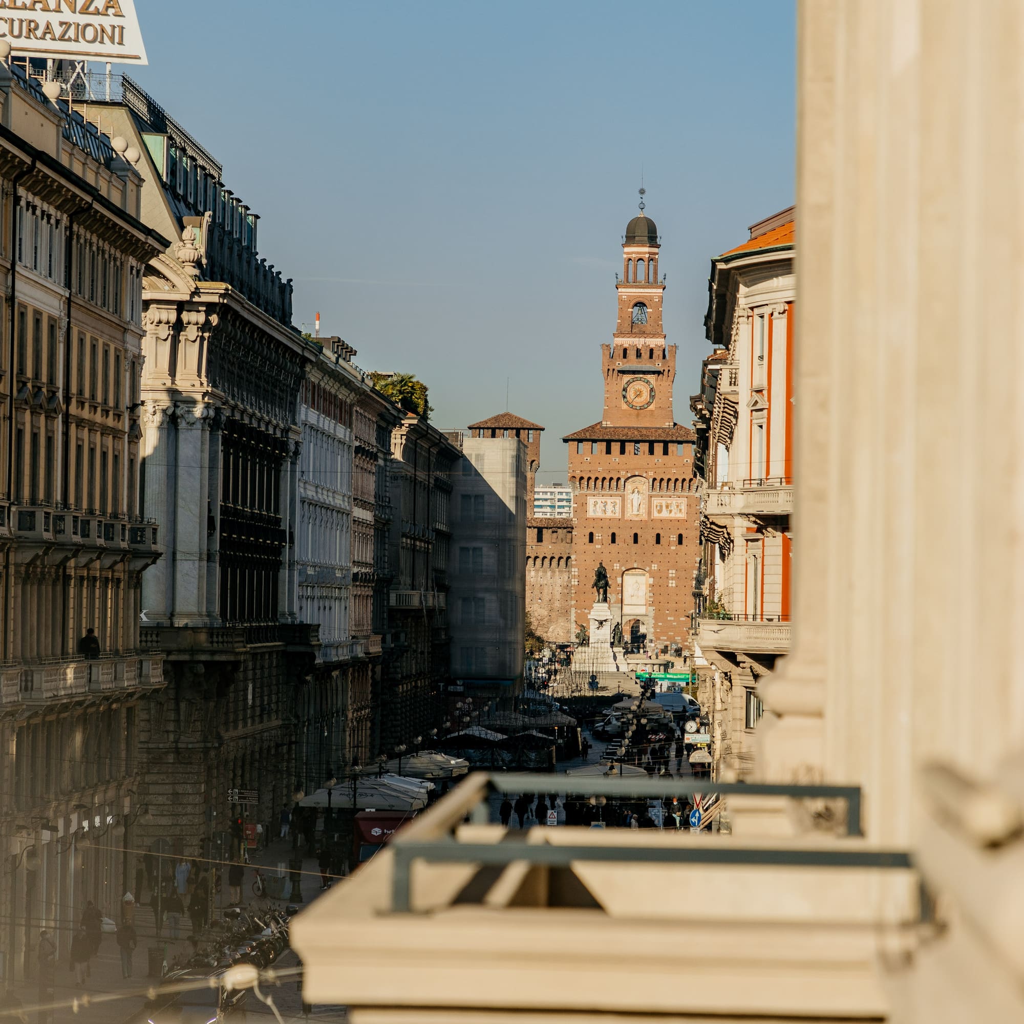 a city street with a clock tower
