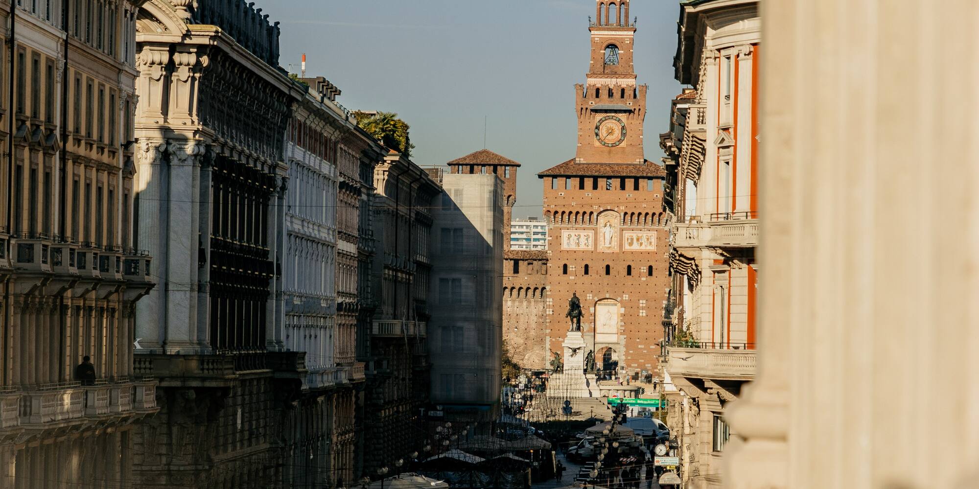 a city street with a clock tower