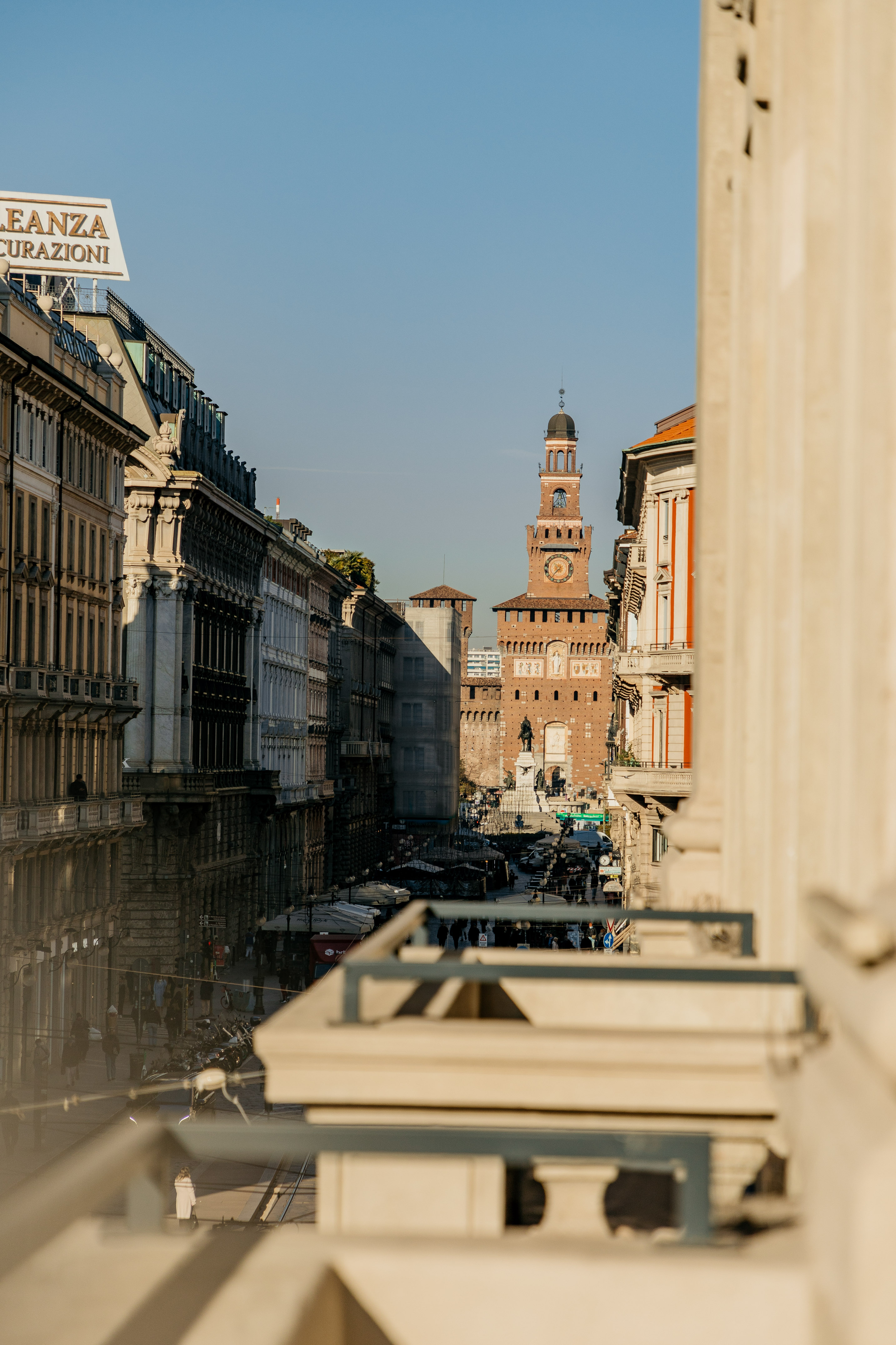 a city street with a clock tower