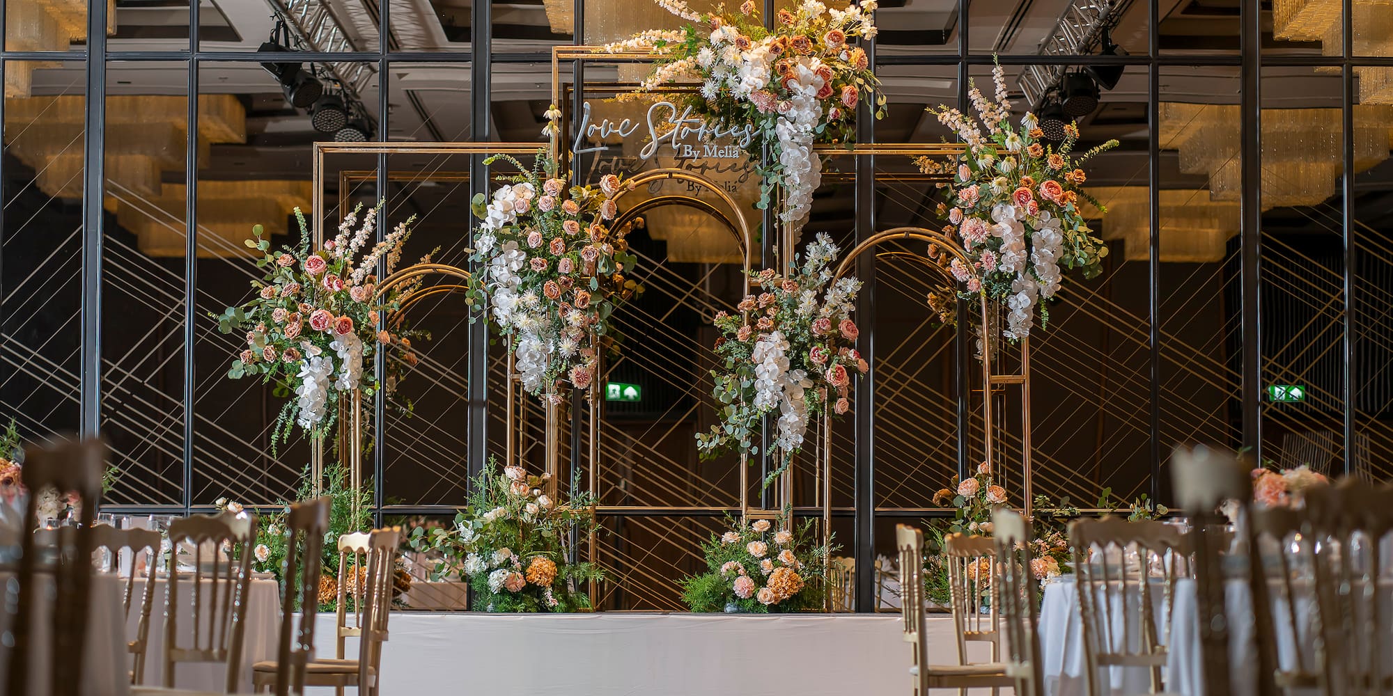 a wedding ceremony with chairs and flowers