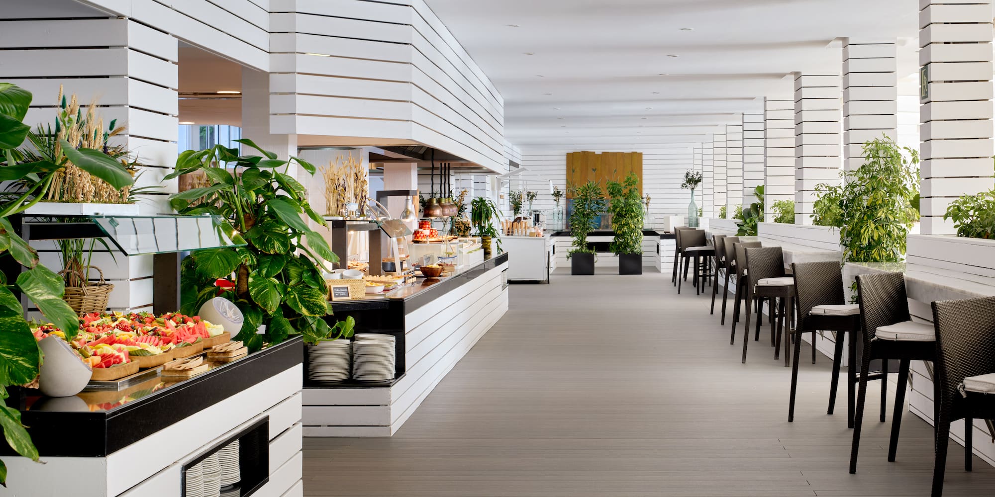 a restaurant with tables and chairs