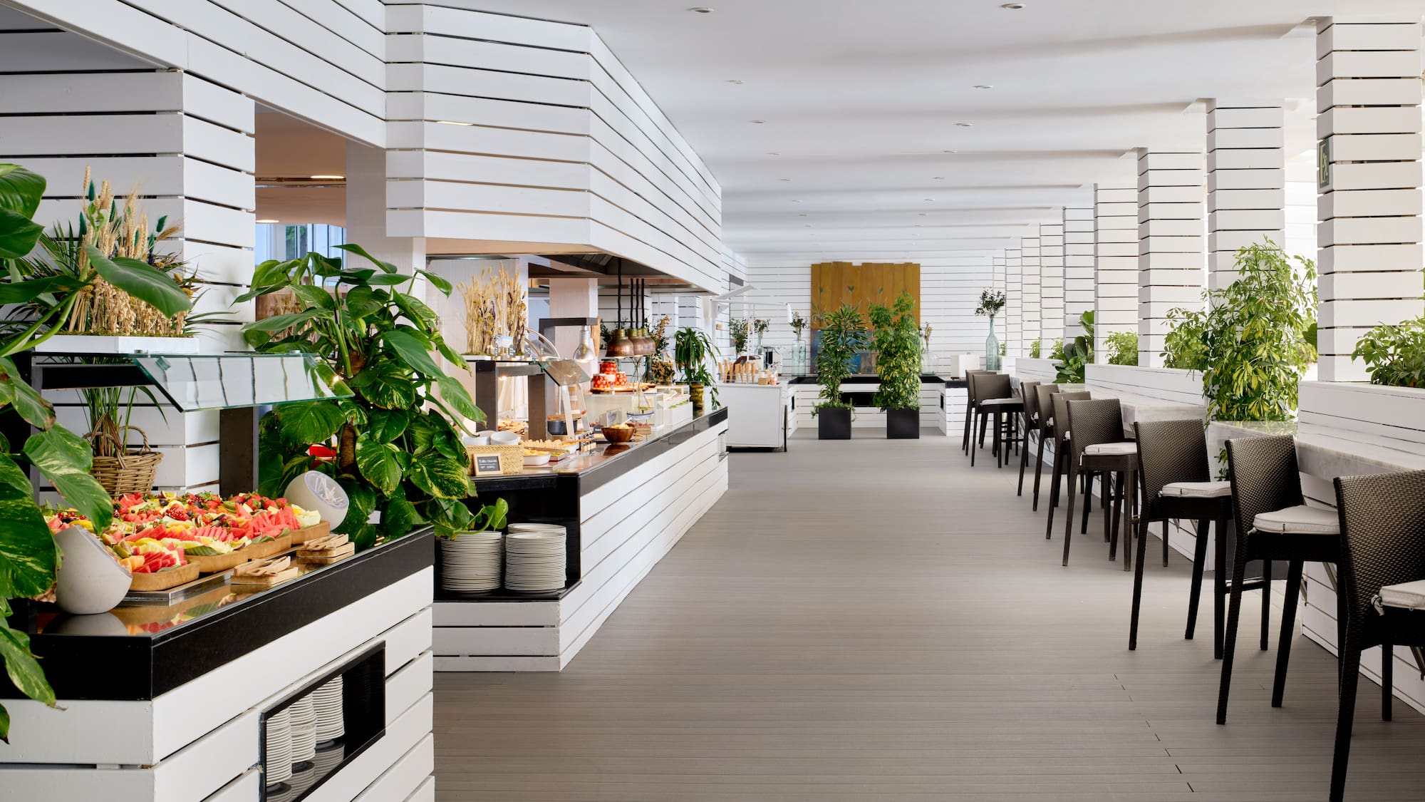 a restaurant with tables and chairs