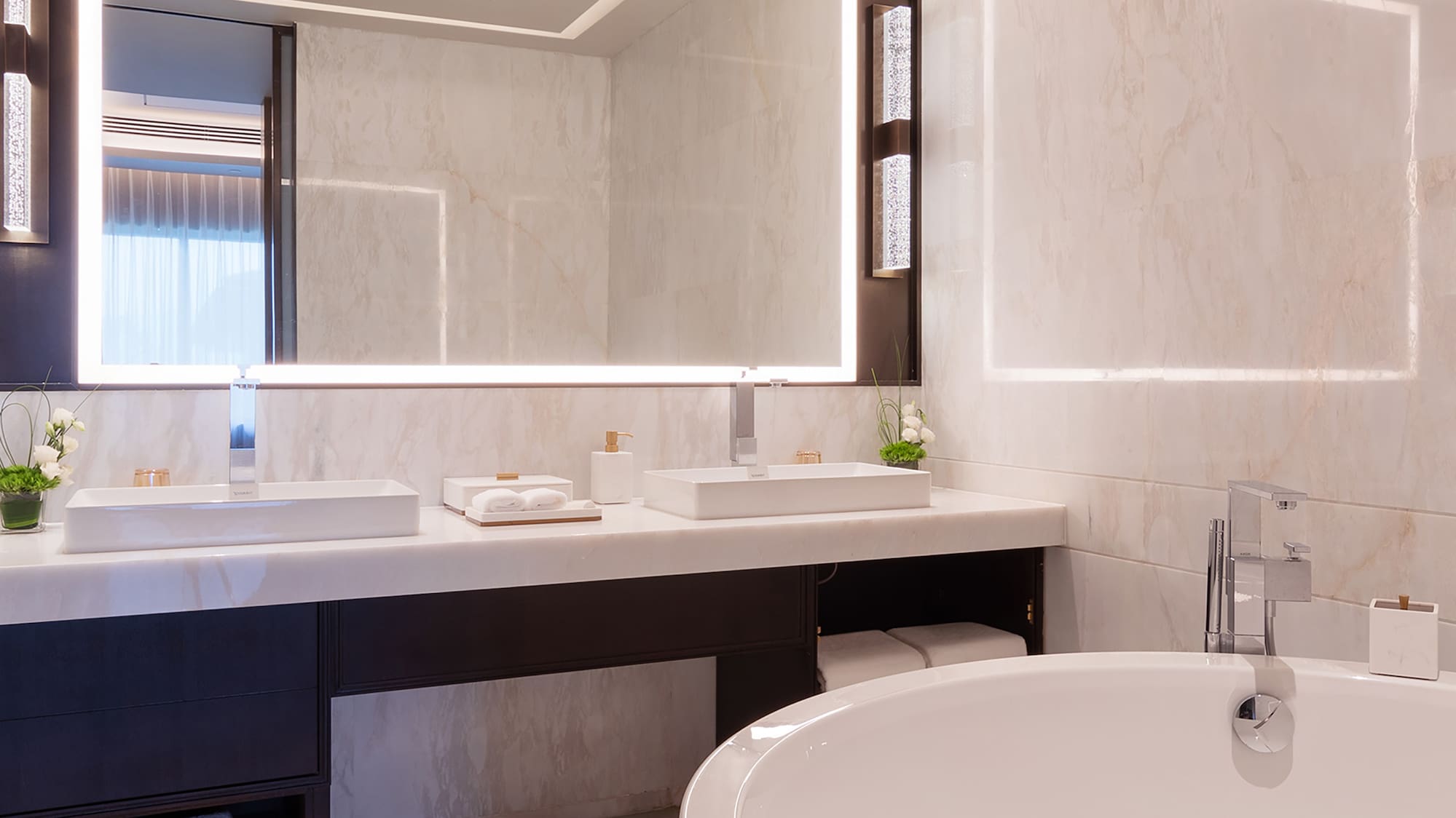 a bathroom with a large mirror