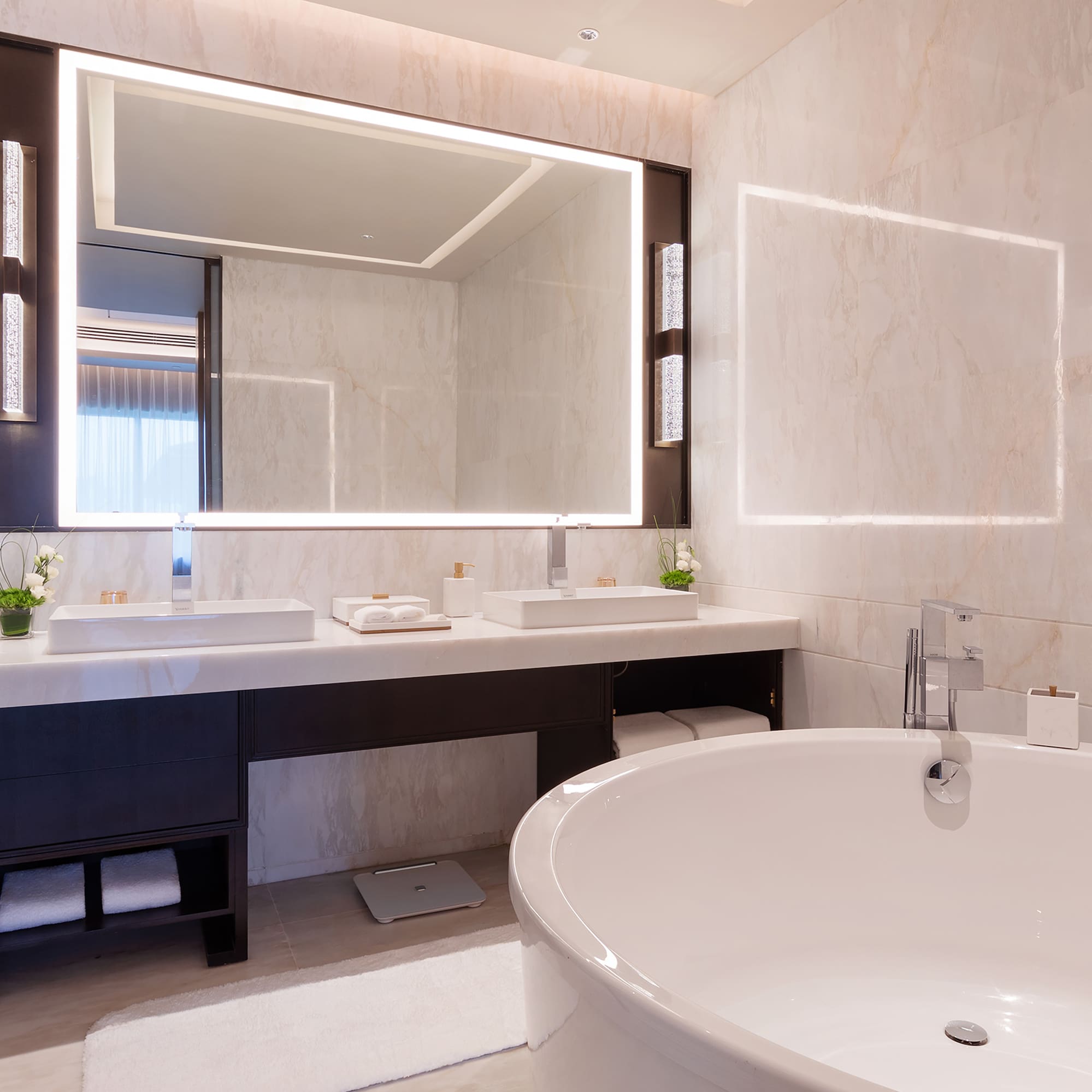 a bathroom with a large mirror