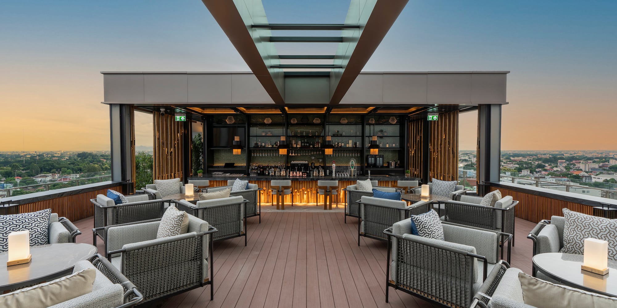 a patio with chairs and a bar