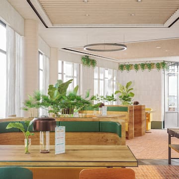 a room with green and white furniture