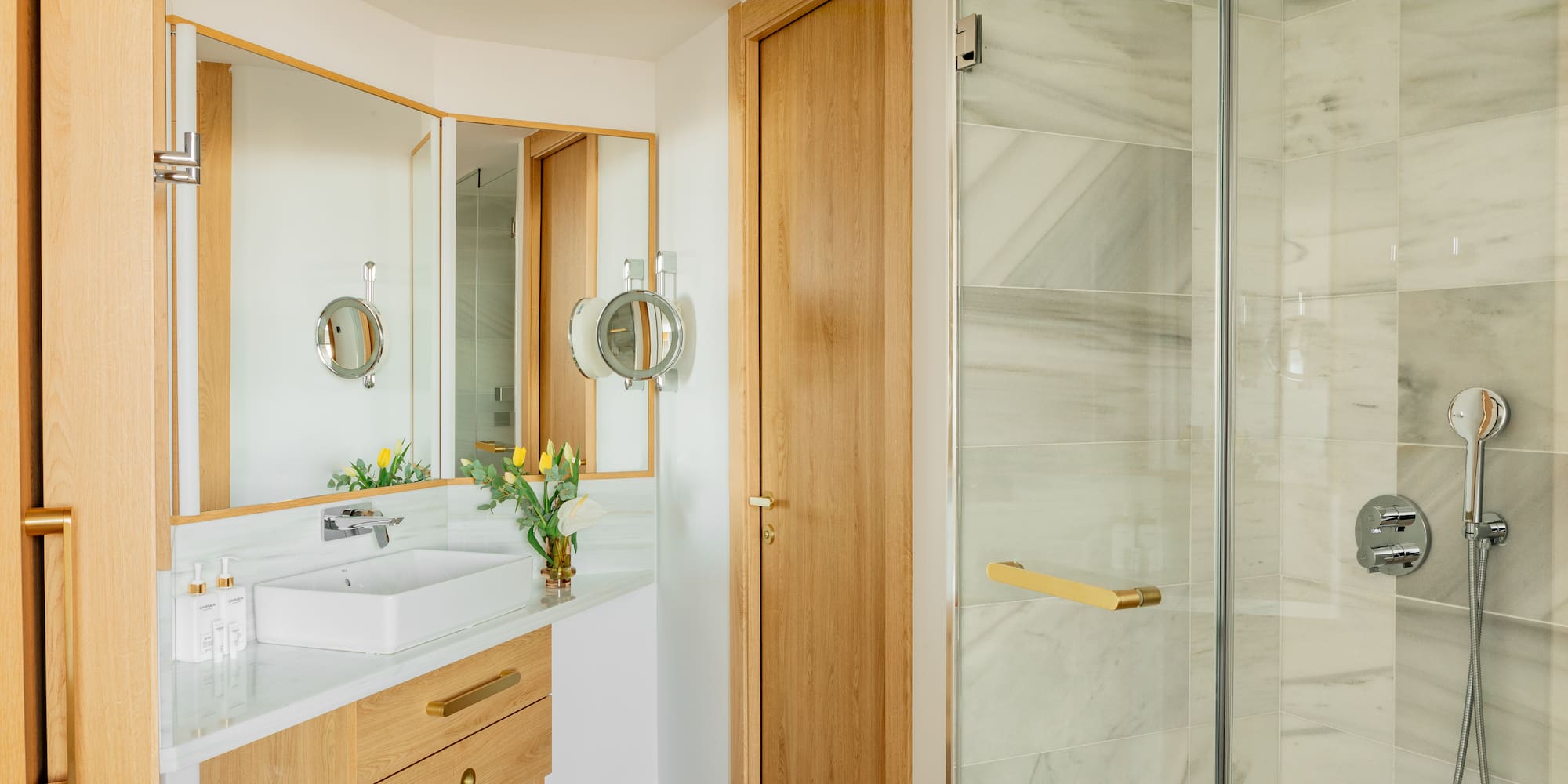 a bathroom with a sink and shower