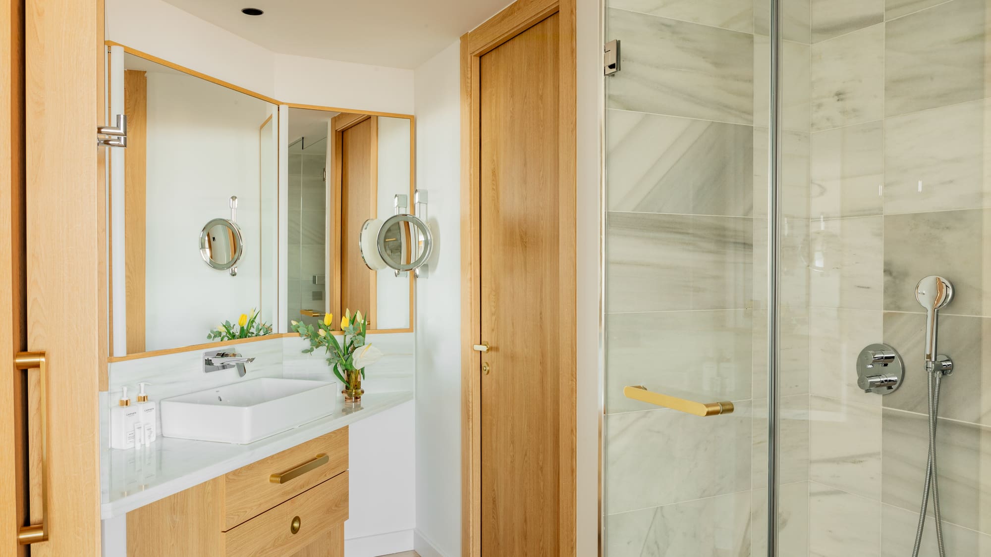 a bathroom with a sink and shower