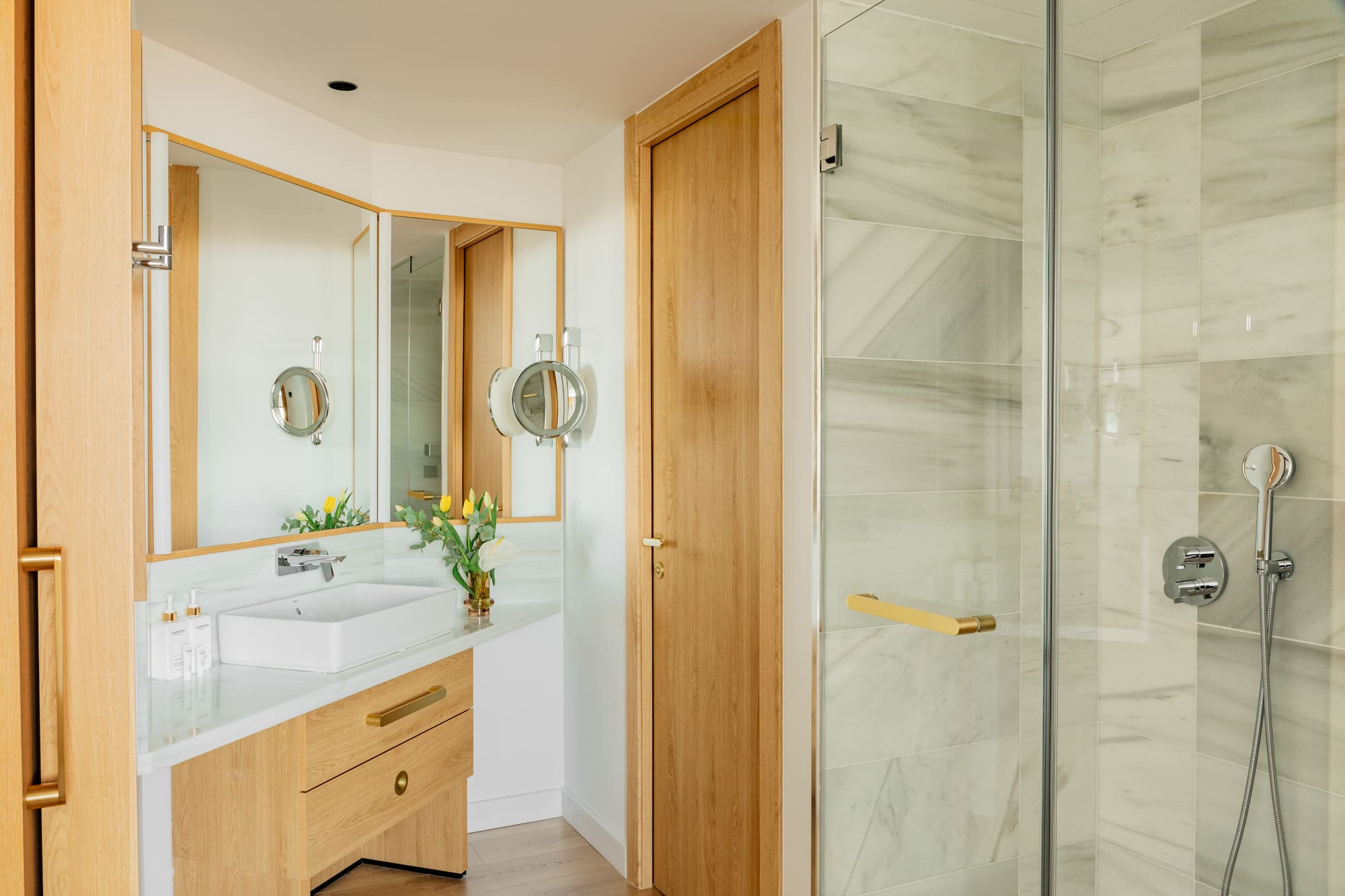 a bathroom with a sink and shower