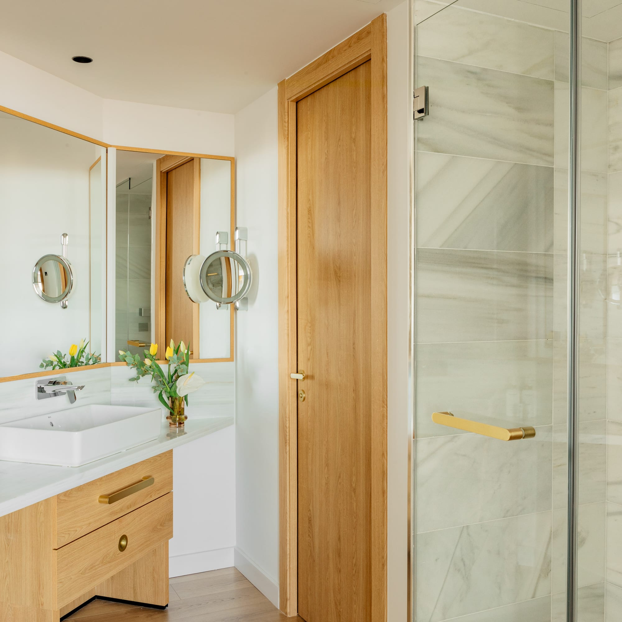 a bathroom with a sink and shower
