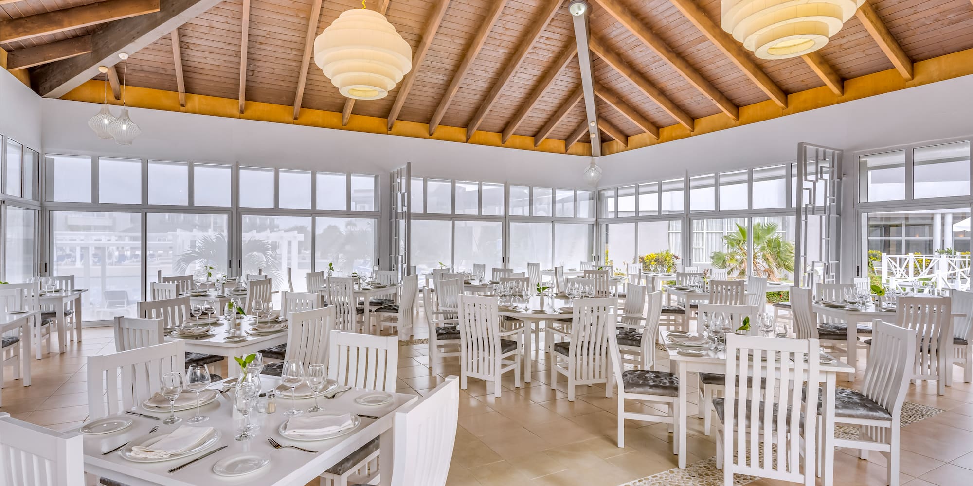 a room with tables and chairs