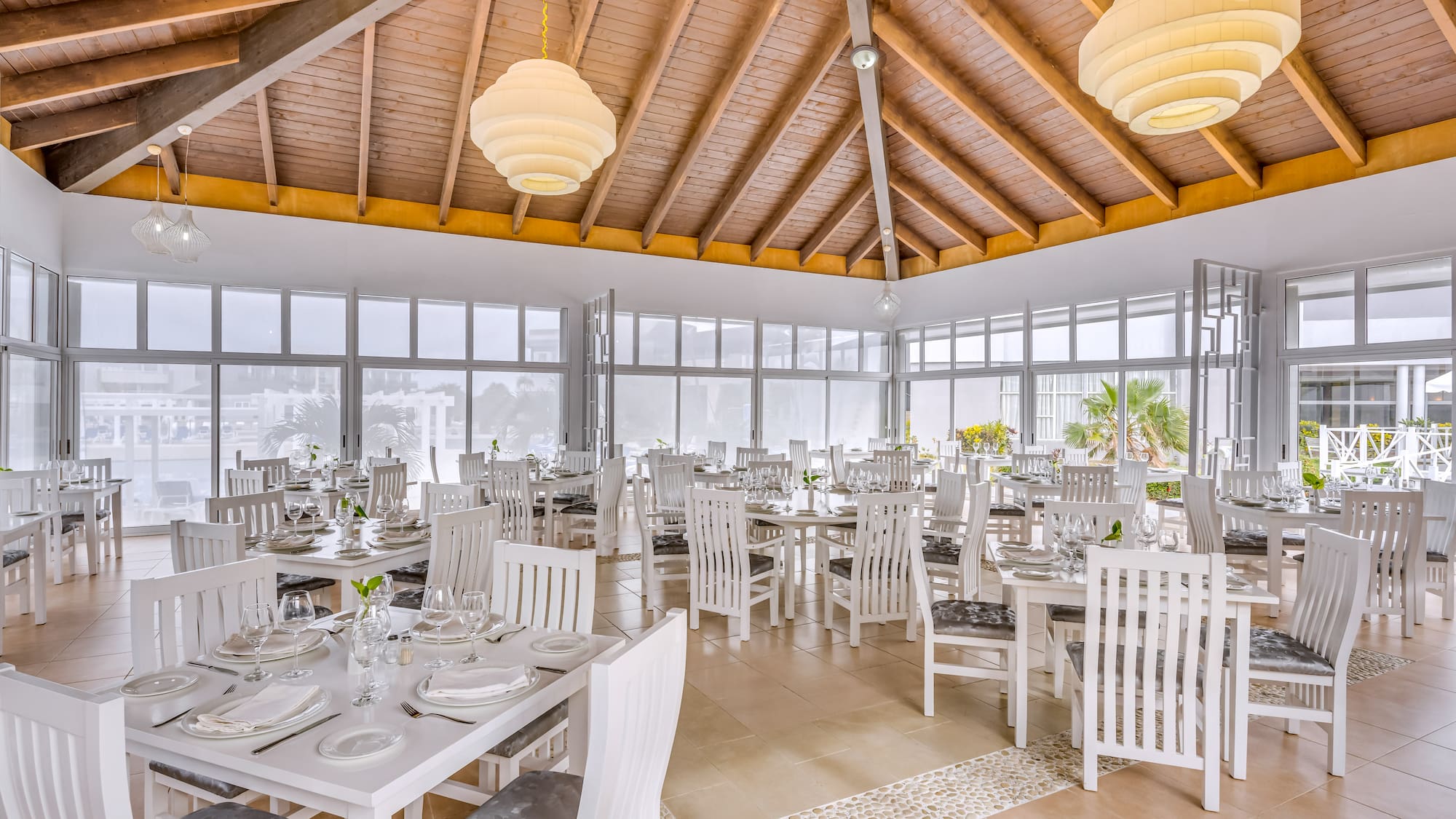 a room with tables and chairs