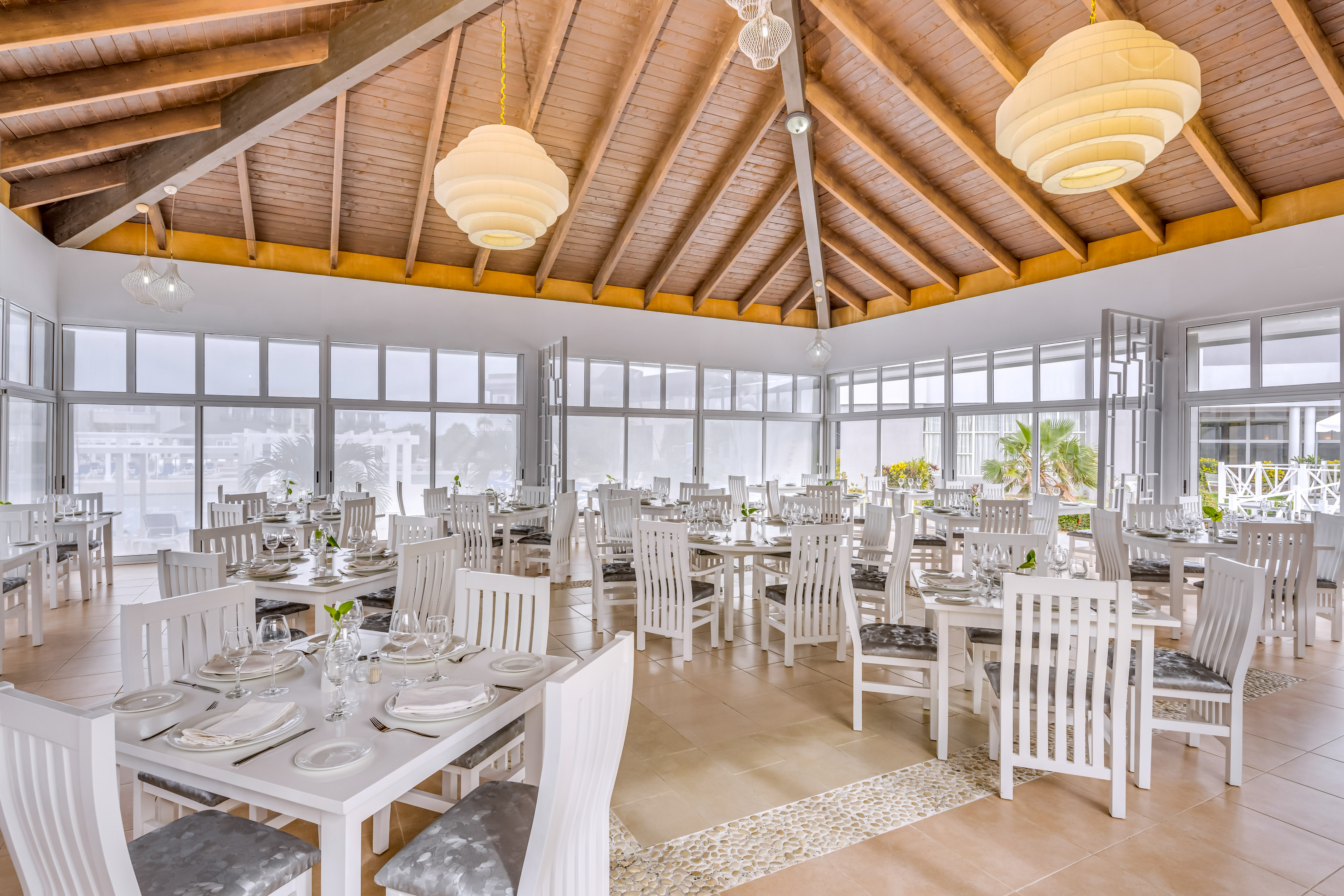 a room with tables and chairs