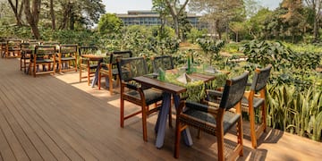 a table and chairs on a deck