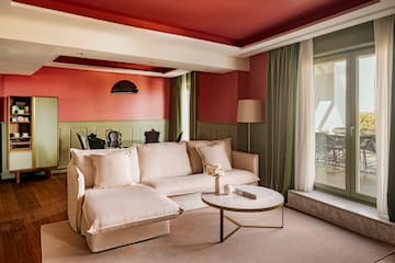 a living room with a couch and a table