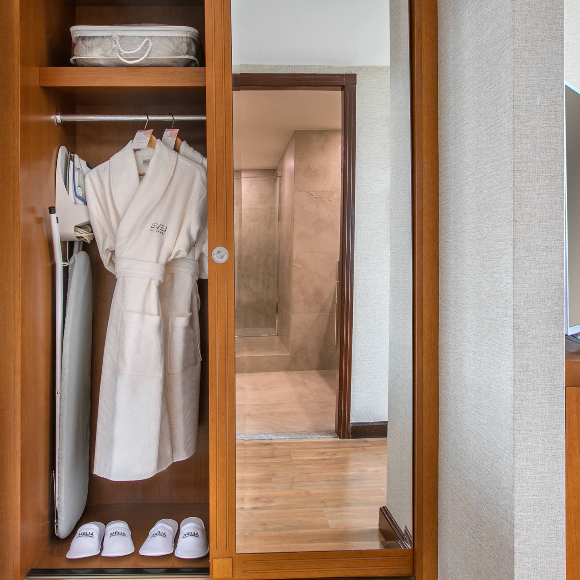 a white robe in a closet