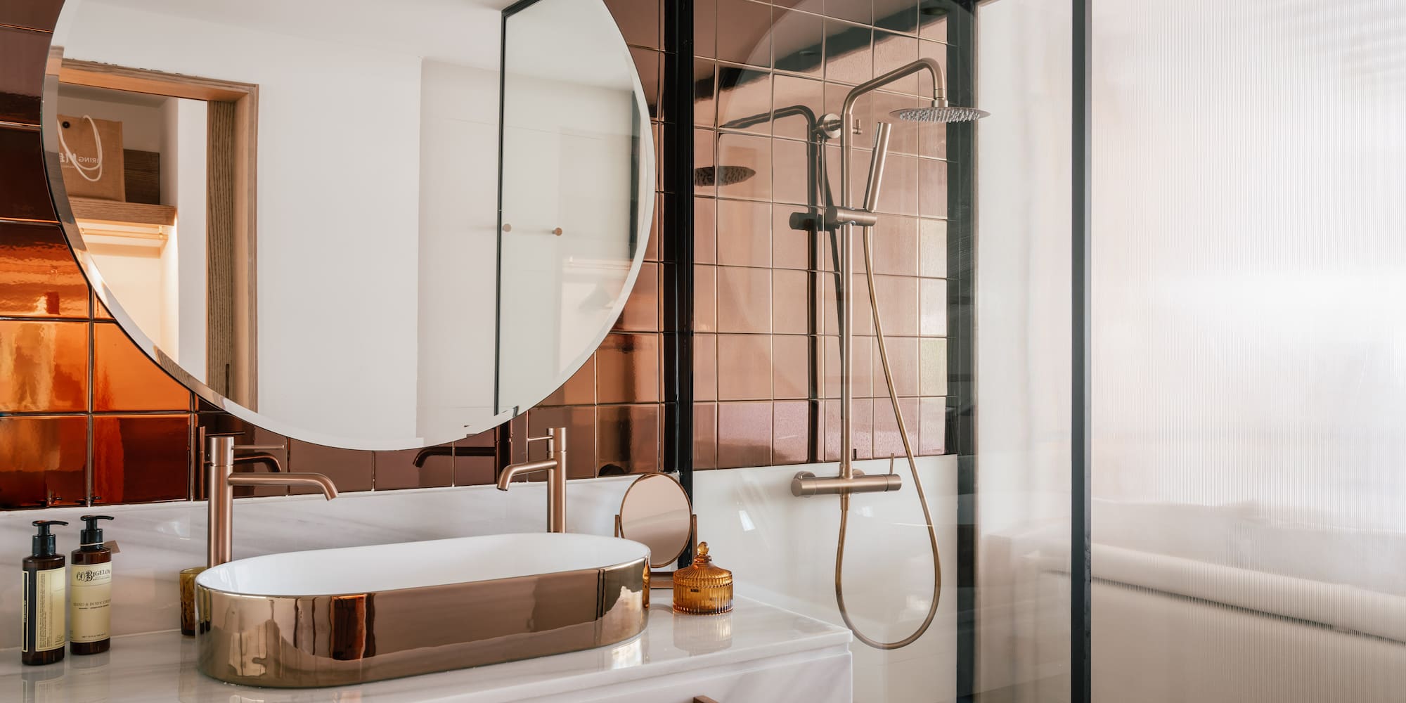 a bathroom with a sink and shower