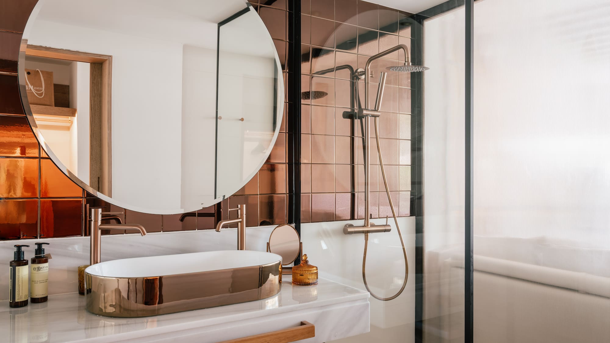 a bathroom with a sink and shower