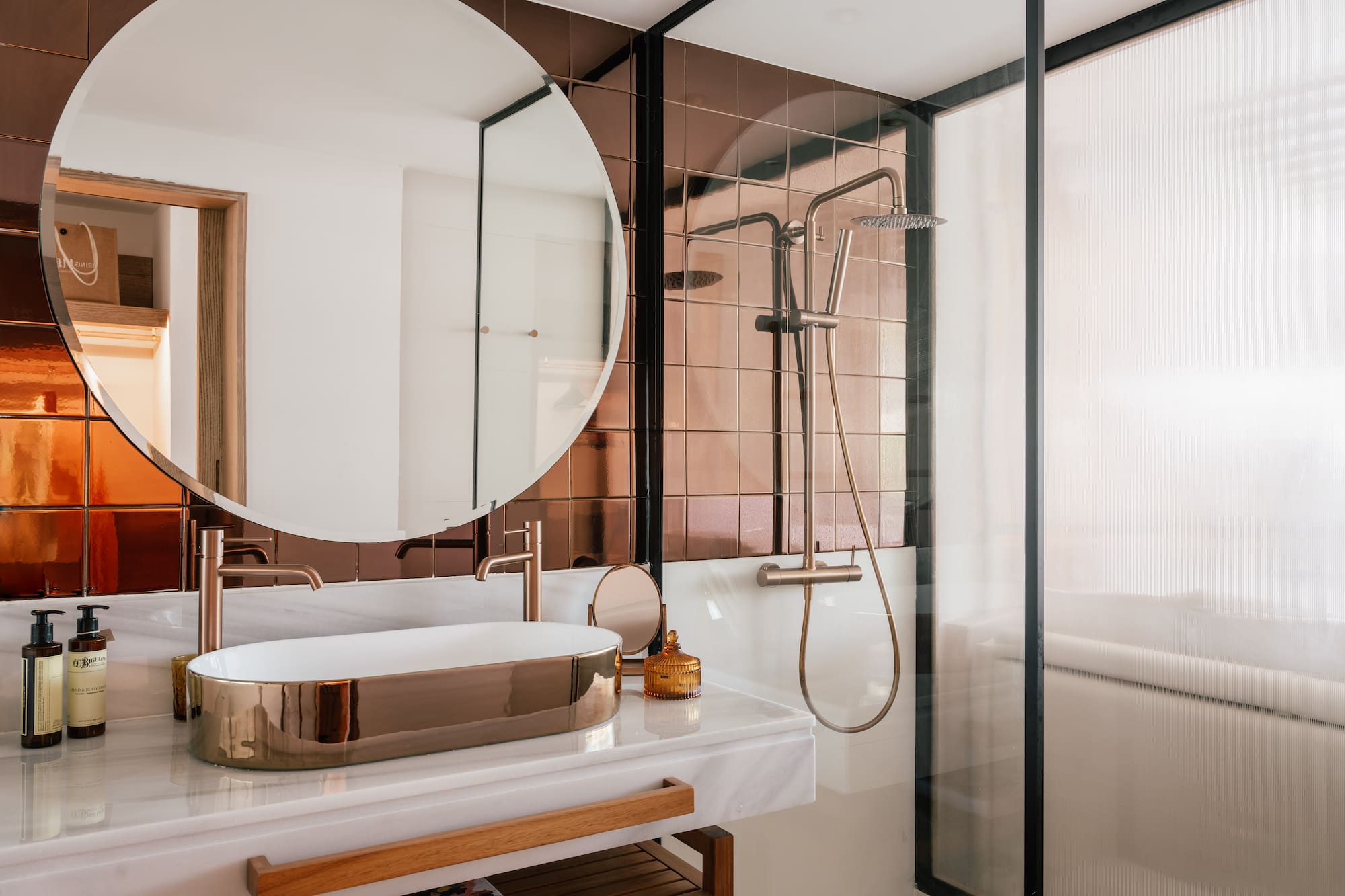 a bathroom with a sink and shower