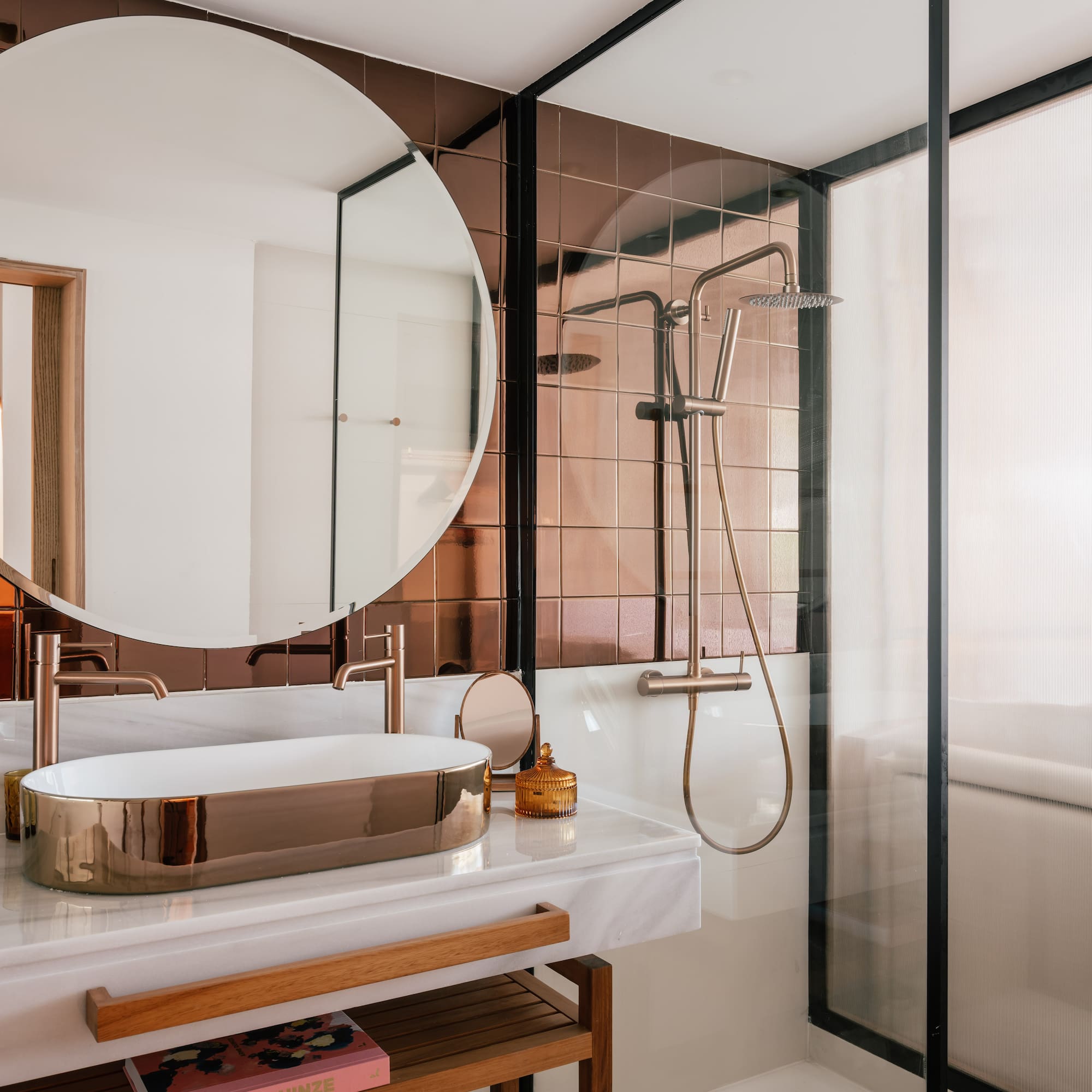 a bathroom with a sink and shower