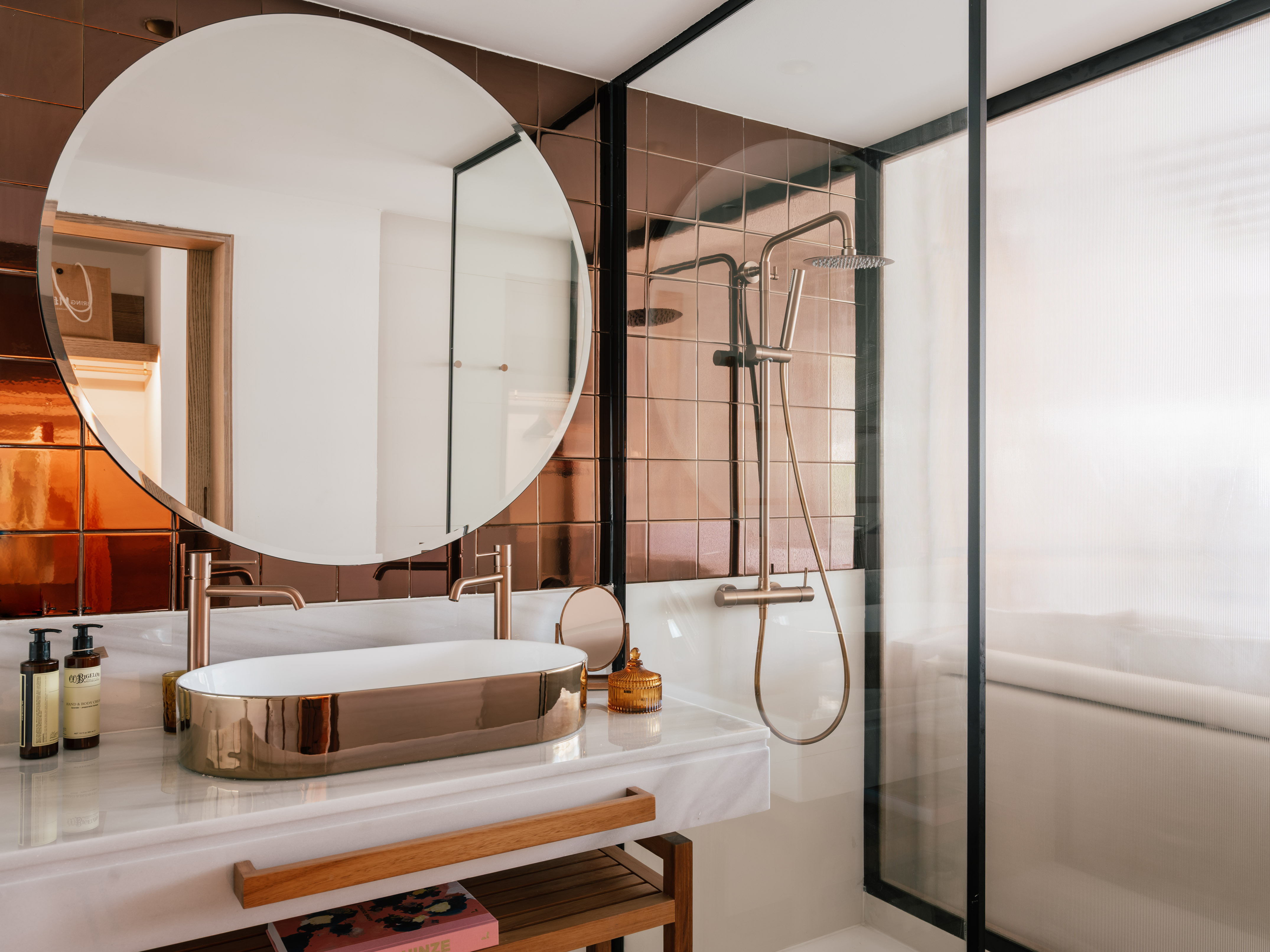 a bathroom with a sink and shower