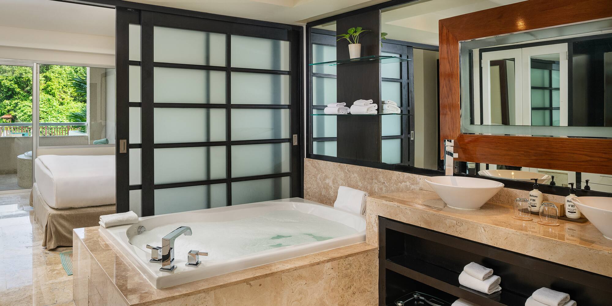 a bathroom with a tub and sink