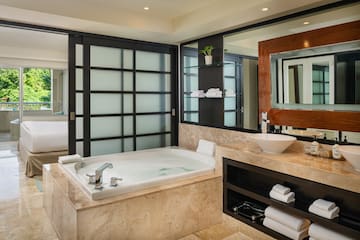a bathroom with a tub and sink