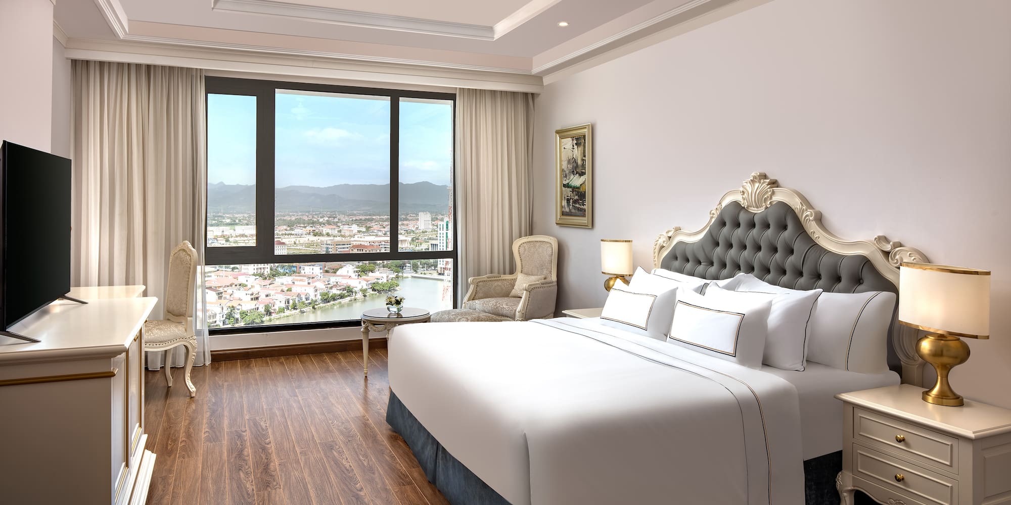 a bedroom with a large bed and a window