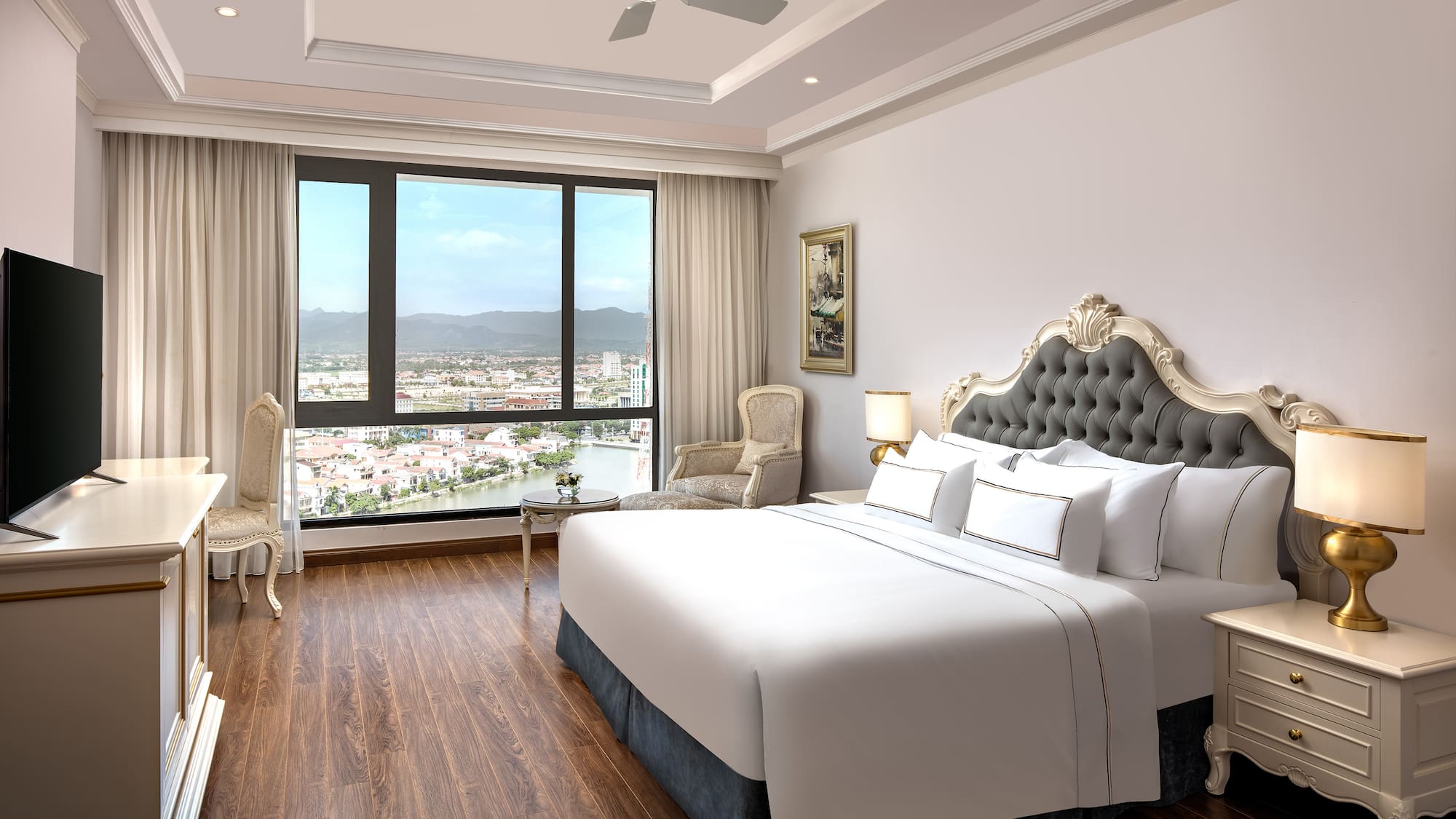 a bedroom with a large bed and a window